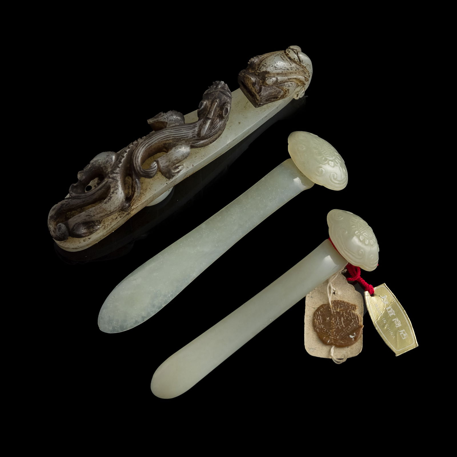 A Chinese white jade dragon hook and two hairpins, 18th century (1 of 9)