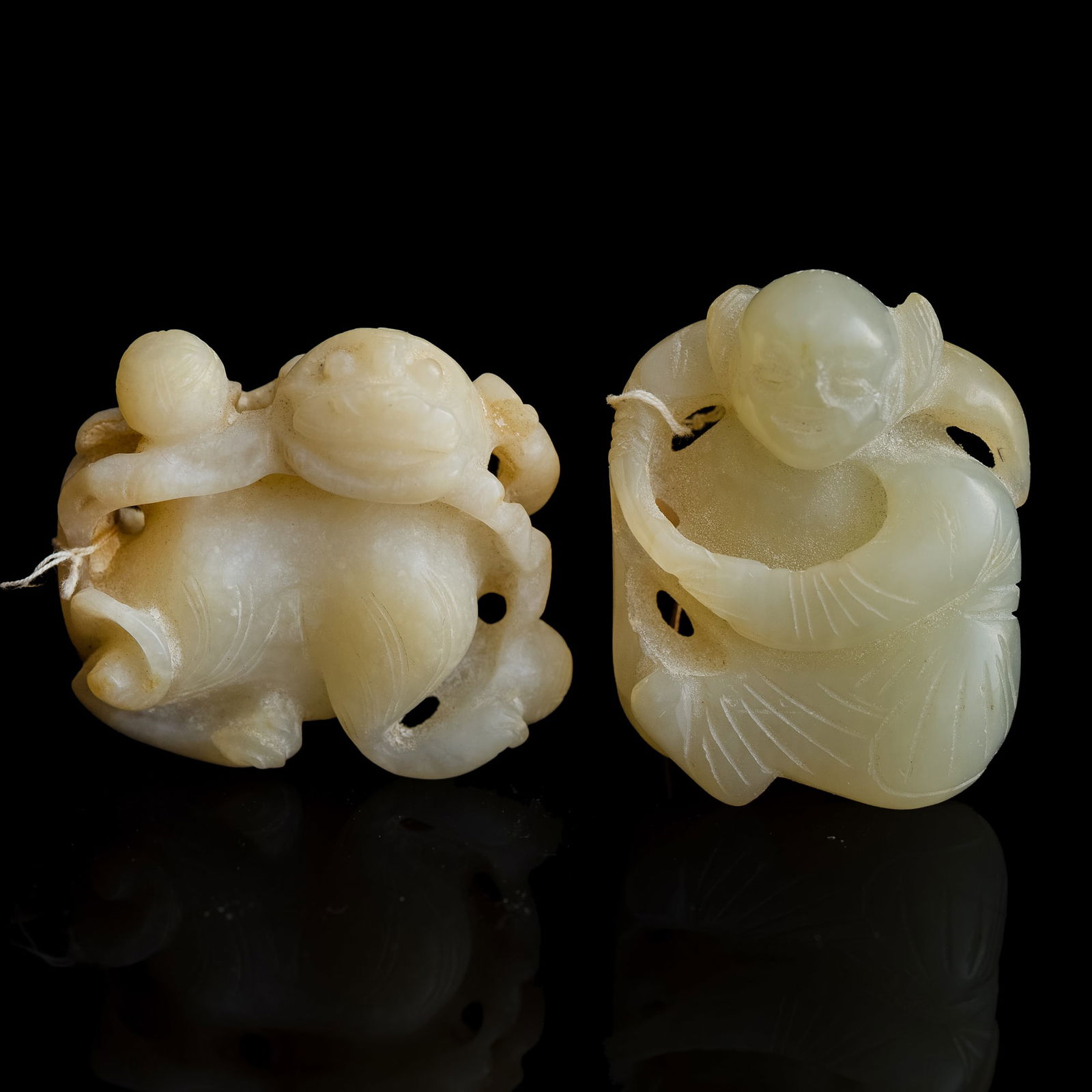 A Chinese jade boy and a pendant of a beast, 18th/19th century (1 of 10)