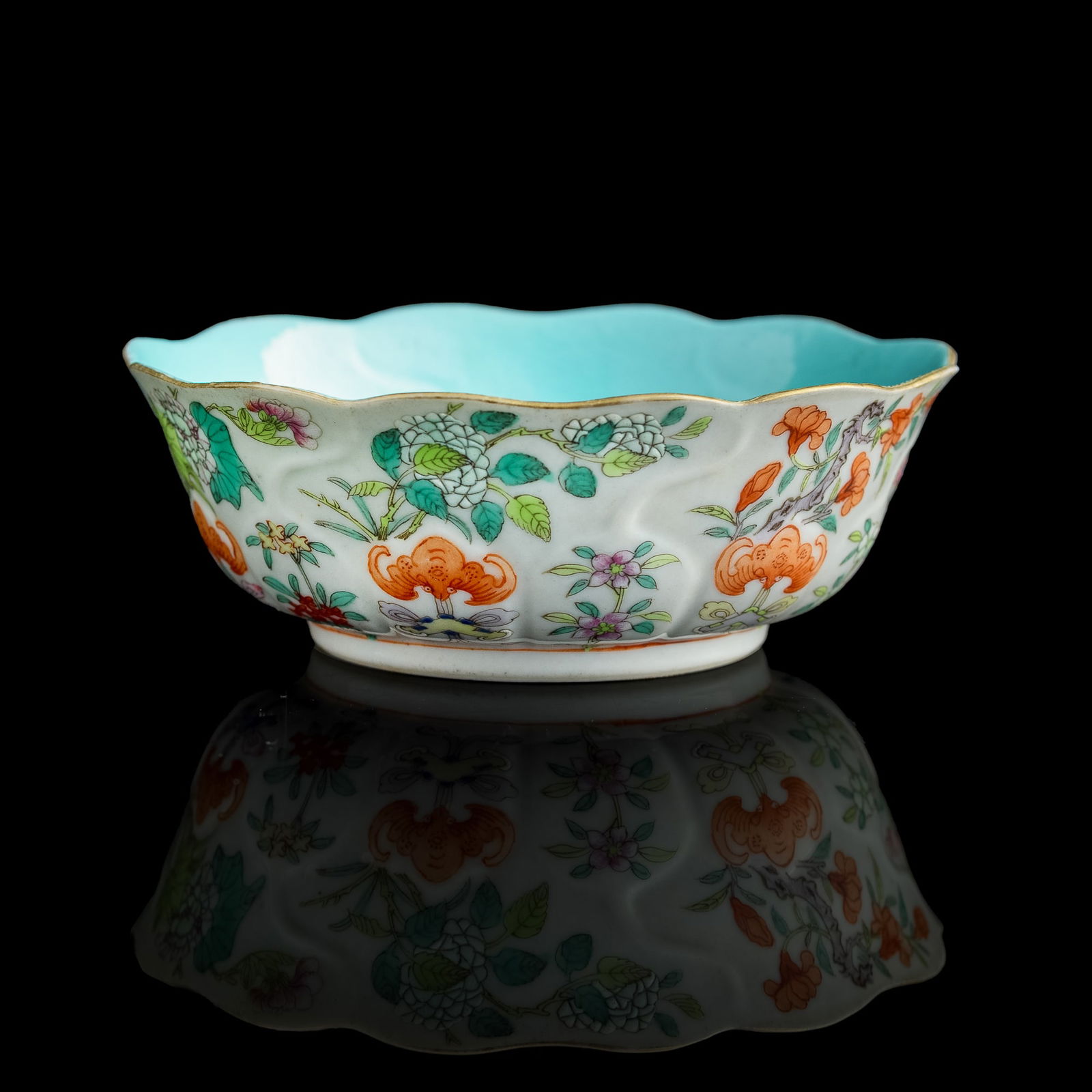 A Chinese famille rose 'floral' foliate-rim bowl, Jiaqing period, Qing dynasty (1 of 10)