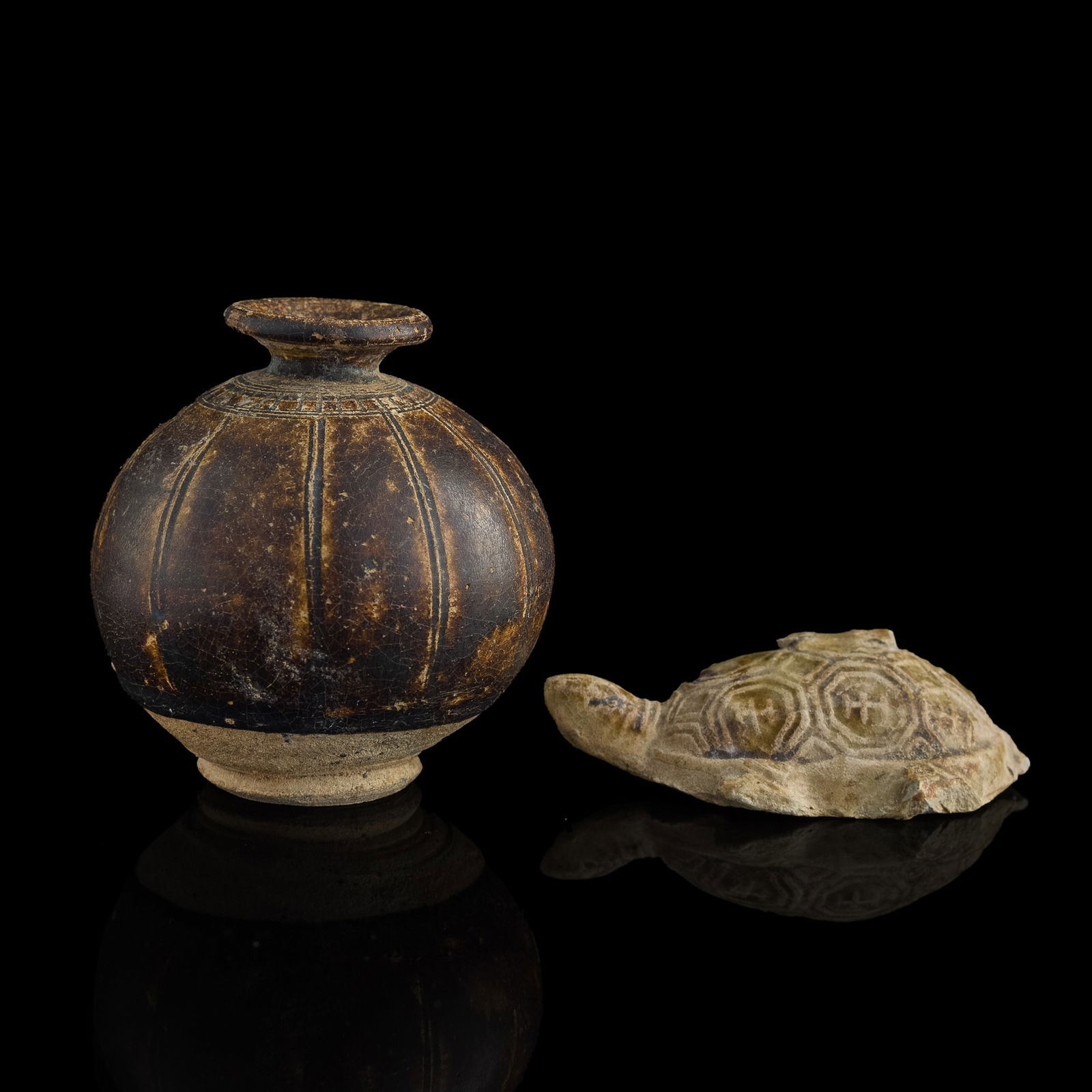A Chinese black-glazed jar and a celadon-glazed turtle, Song/Yuan dynasty (1 of 8)
