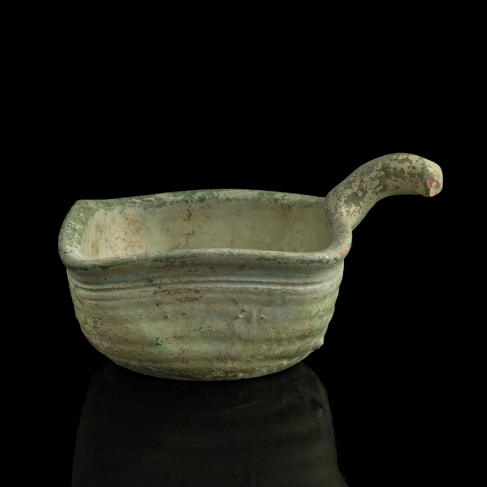 A Chinese green-glazed pottery Yi vessel, Han dynasty (1 of 8)