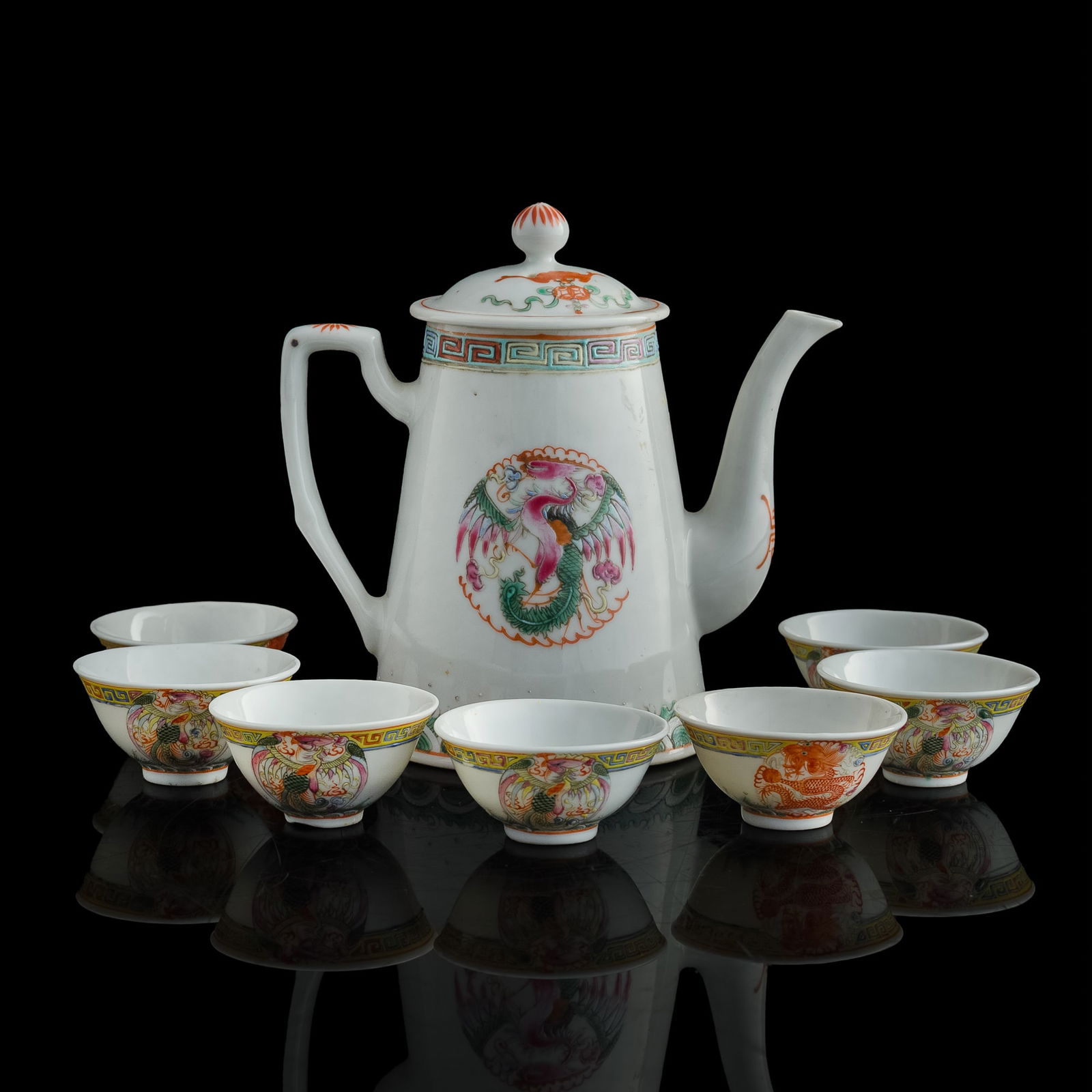 A Chinese famille rose teapot and seven tea cups, Republic period (1 of 14)