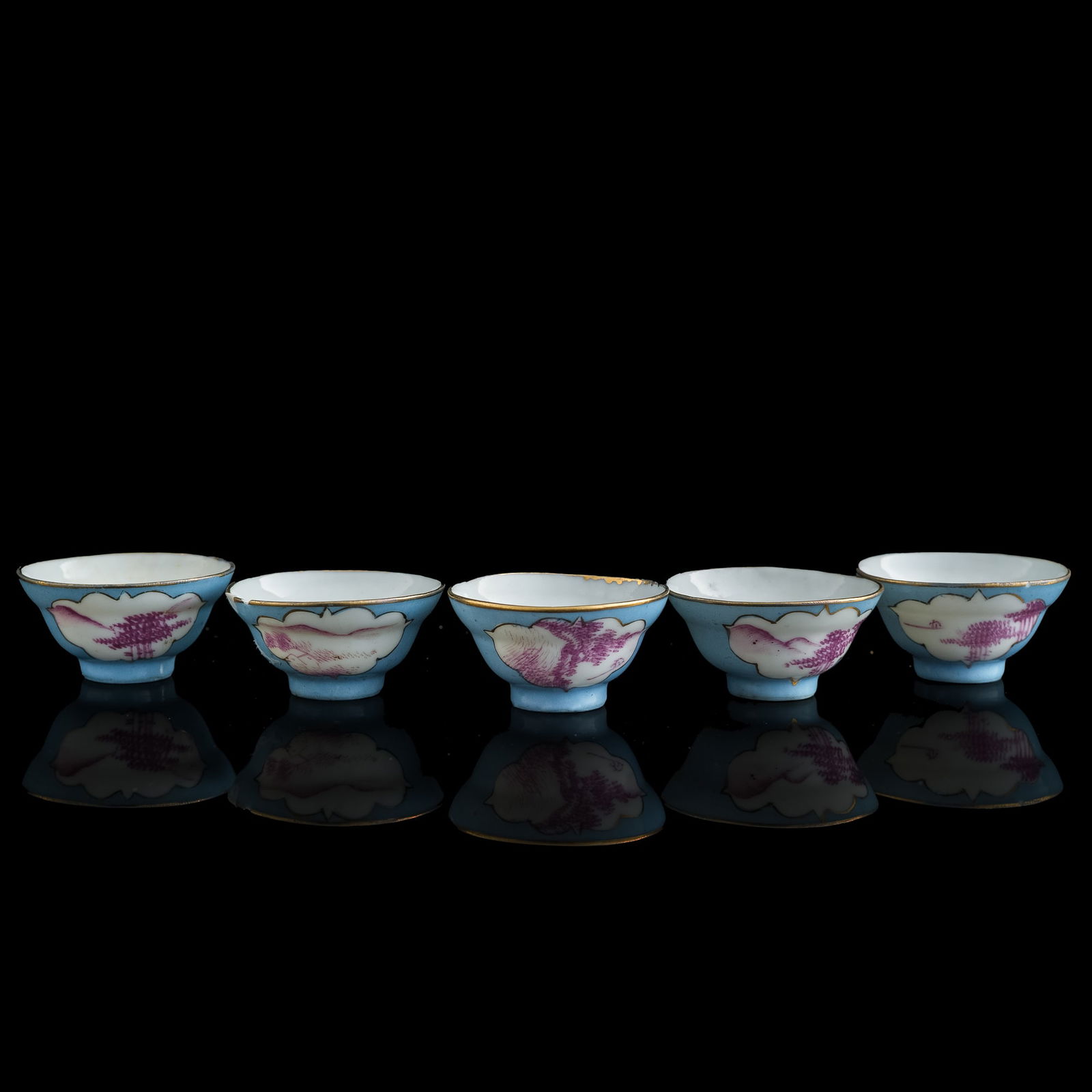 Five small Chinese blue-ground and ruby-red cups, Republic period: Five small Chinese blue-ground and ruby-red cups Republic period Each with "Hongxian nian zhi" mark to underside. (5). H: 7/8, Dia: 1 3/4 in. (H: 2.2, Dia: 4.4 cm. (each)) From a private collector in