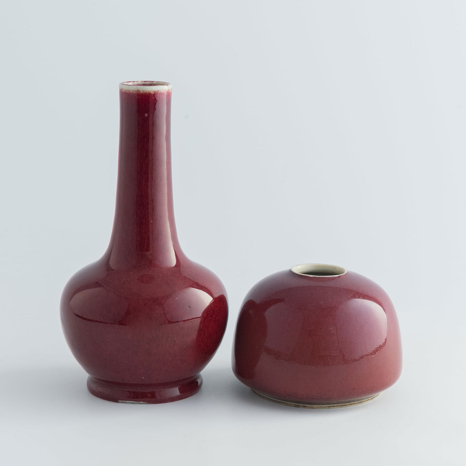 A Chinese red-glazed bottle vase and a water coupe, 19th century (1 of 9)