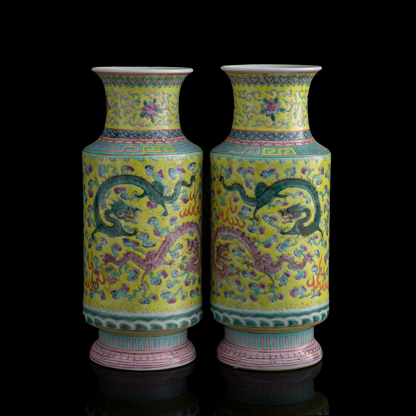 A pair of Chinese famille rose 'dragon' vases, Republic period: A pair of Chinese famille rose 'dragon' vases Republic period Each with a six-character mark to the underside. (2). H: 7 1/2, Dia: 3 1/8 in. (H: 19.1, Dia: 7.9 cm. (each)) Private collection, Saratoga