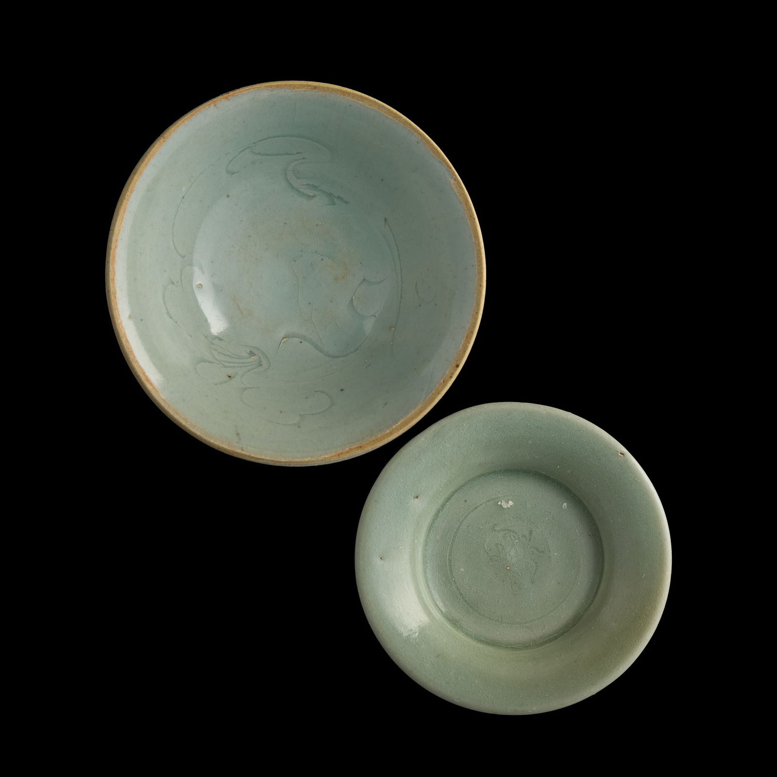 A Chinese Longquan celadon dish and a Qingbai-glazed bowl, Song/Yuan dynasty (1 of 9)