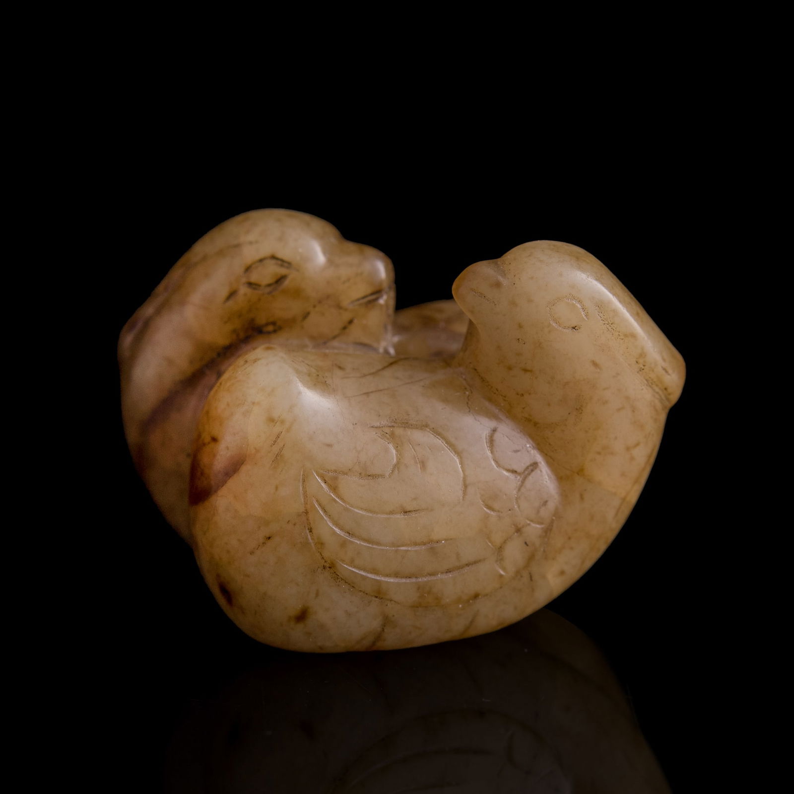 A Chinese jade pendant of mandarin ducks, Ming dynasty (1 of 6)