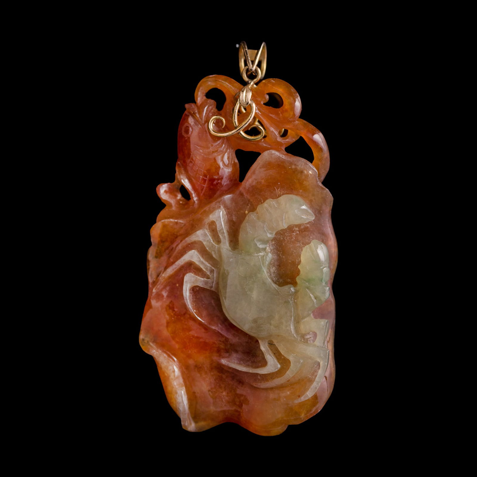 A Chinese jadeite 'crab' pendant, Qing dynasty: A Chinese jadeite 'crab' pendant Qing dynasty H: 2 3/4, W: 1 1/2, D: 1/2 in. (H: 7, W: 3.8, D: 1.3 cm.) From a private collector in Honolulu, Hawaii. Click here