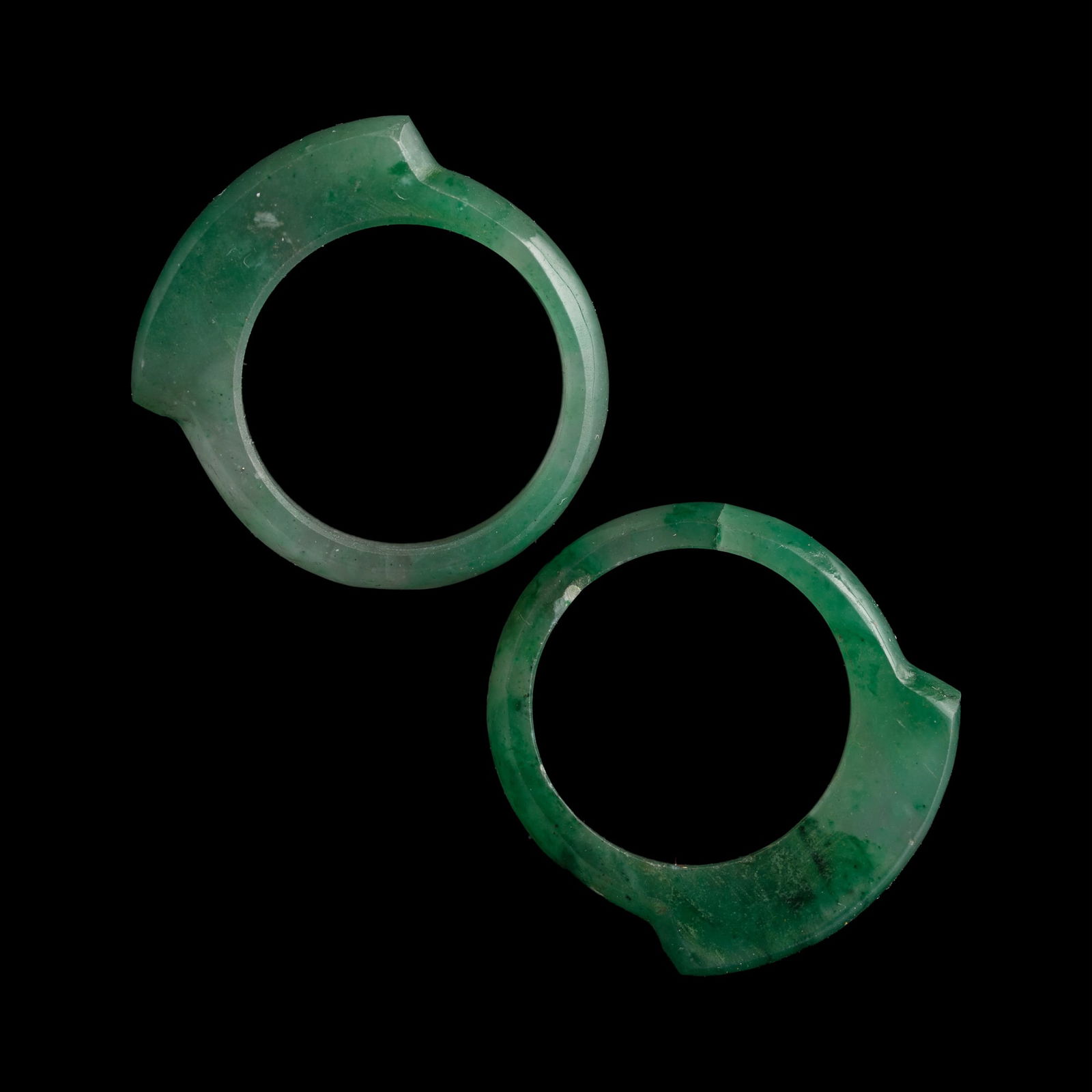 A pair of Chinese jadeite saddle rings, Qing dynasty (1 of 8)