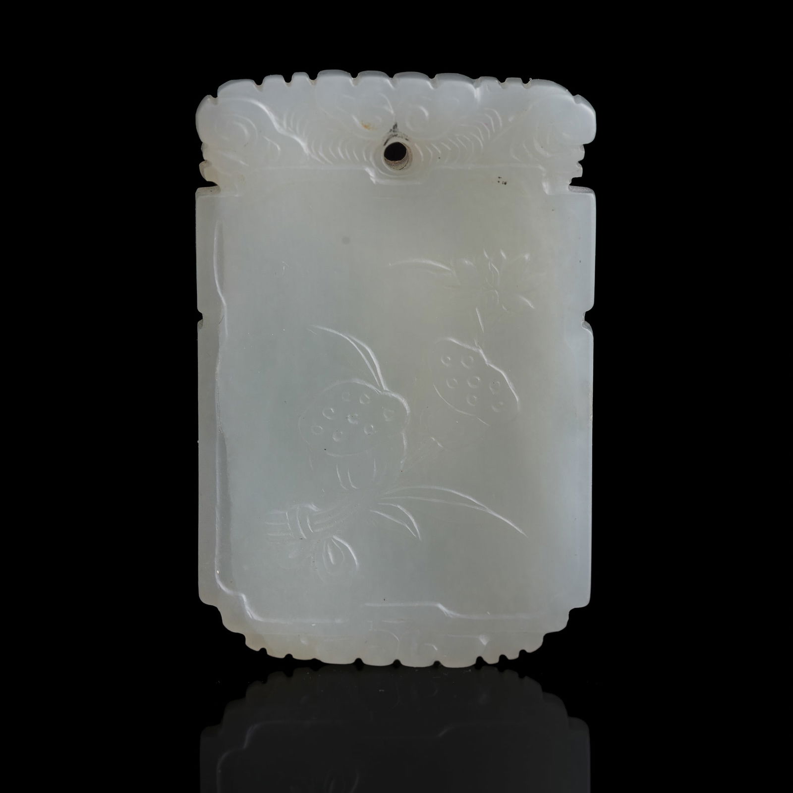 A Chinese white jade 'lotus' plaque, 19th century (1 of 5)