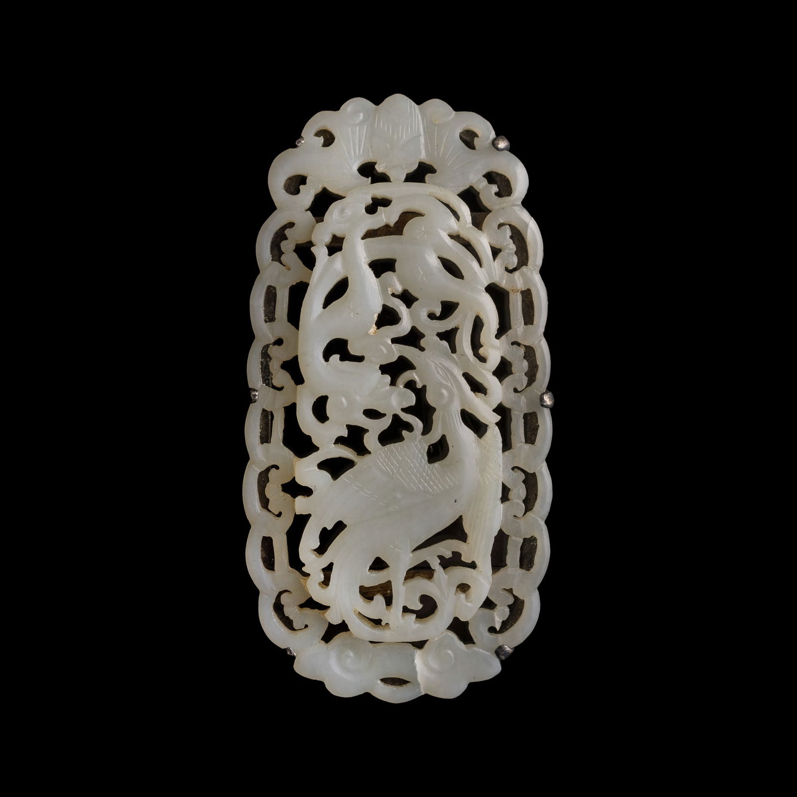 A Chinese reticulated white jade 'dragon and phoenix' plaque, Ming dynasty (1 of 6)