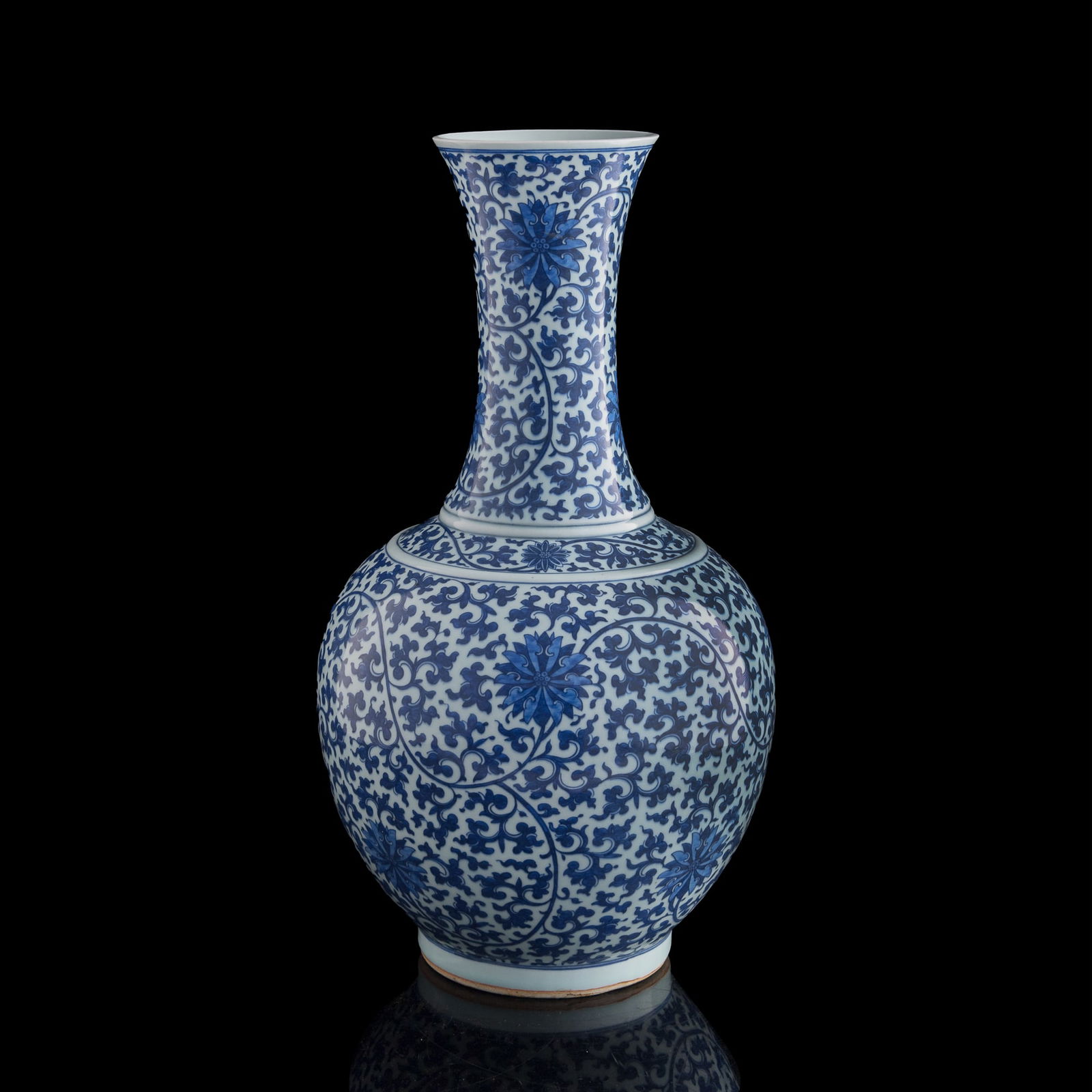 A large Chinese blue and white 'scrolling lotus' shang vase, 19th century: A large Chinese blue and white 'scrolling lotus' shang vase 19th century With six-character mark to underside. H: 22 7/8, Dia: 12 1/4 in. (H: 58.1, Dia: 31.1 cm.) From Mr. Kung in Vancouver, Canada, i