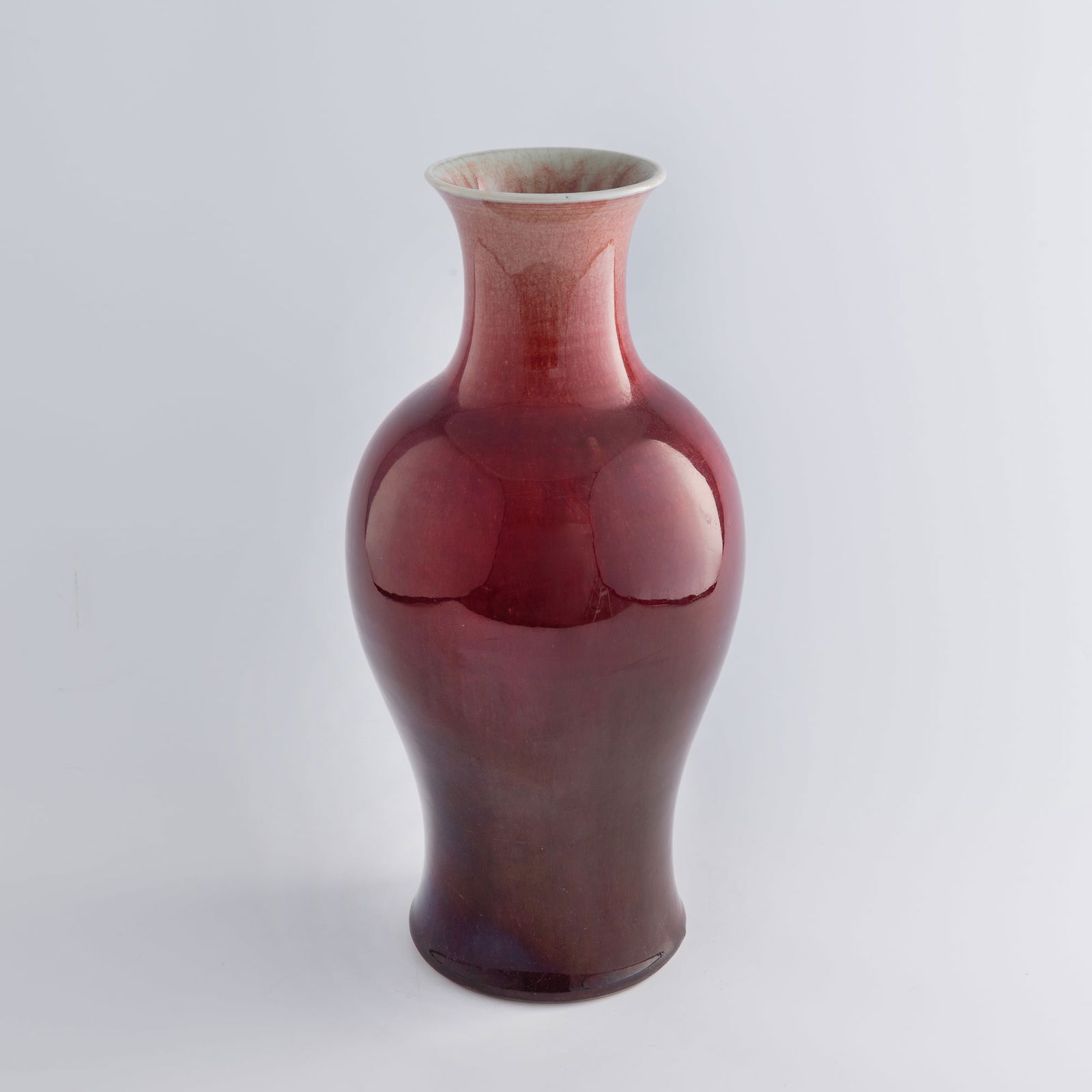 A Chinese red-glazed Guanyin vase, early 19th century (1 of 7)