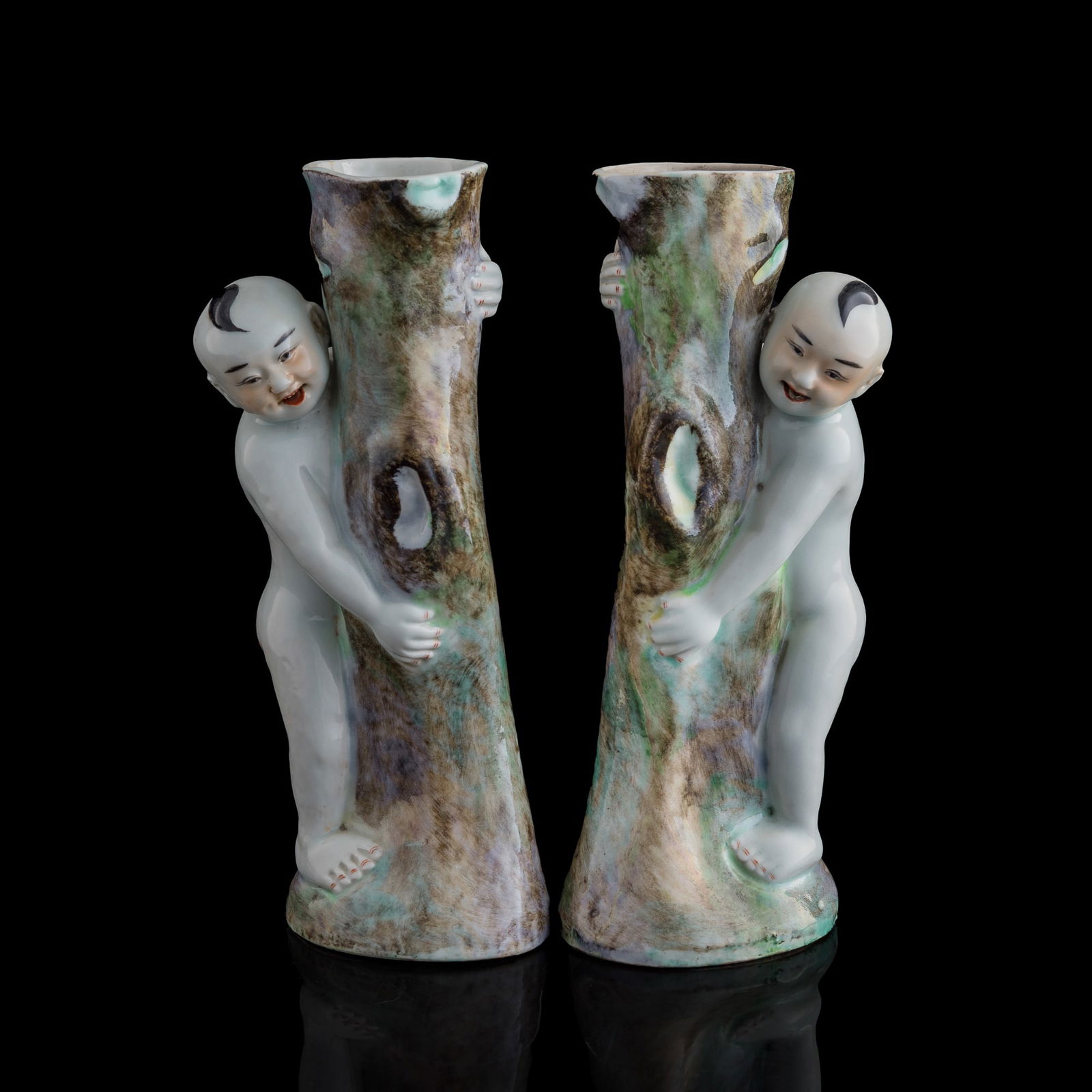 A pair of Chinese famille rose boy-form flower holders, Republic period (1 of 12)