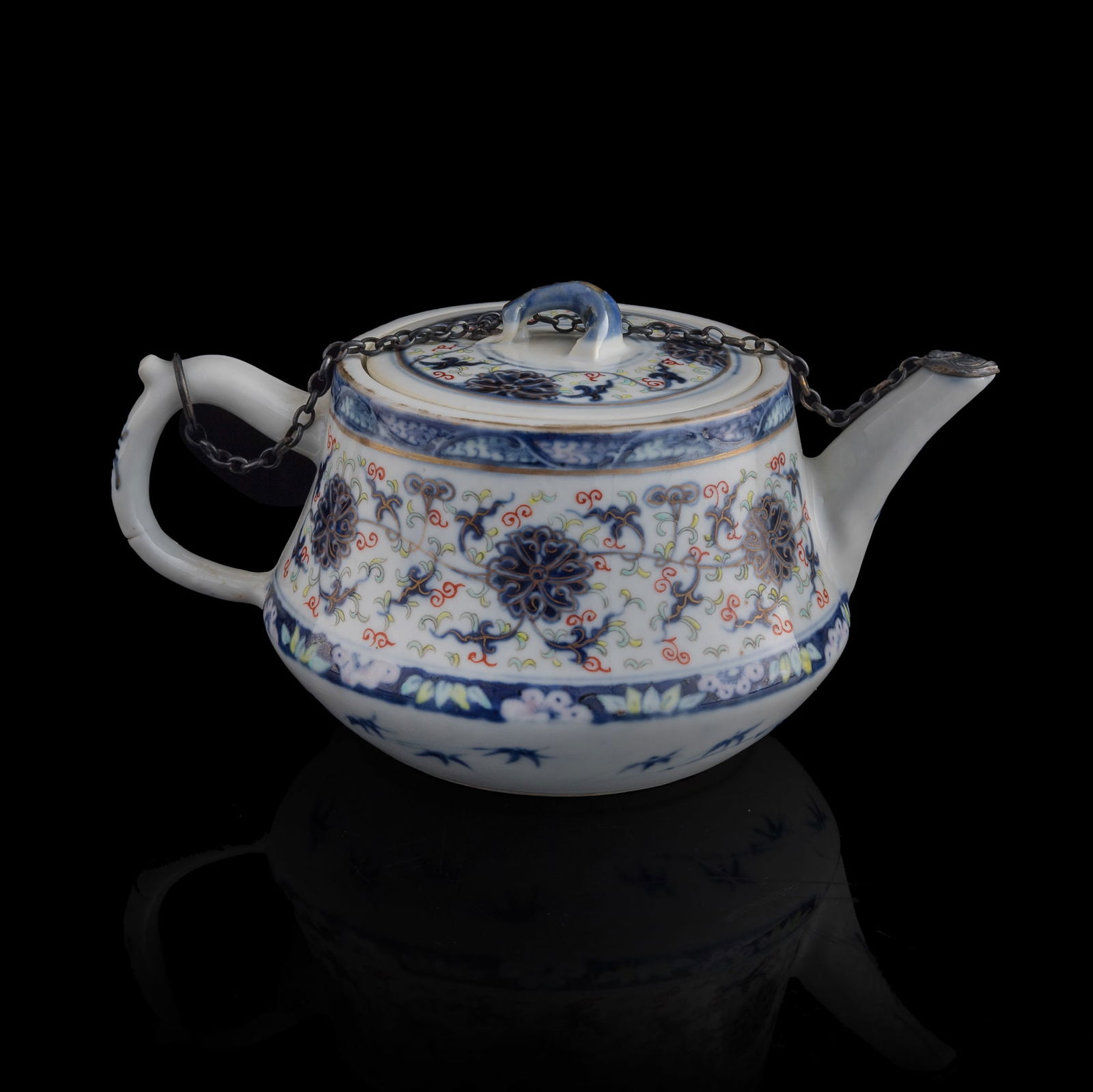 A Chinese blue and enamel 'scrolling lotus' teapot, late 19th century (1 of 8)