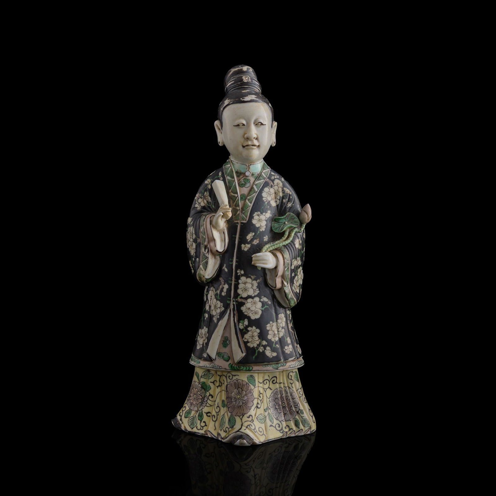 A Chinese black-ground sancai figure of a court lady, late 19th century (1 of 9)
