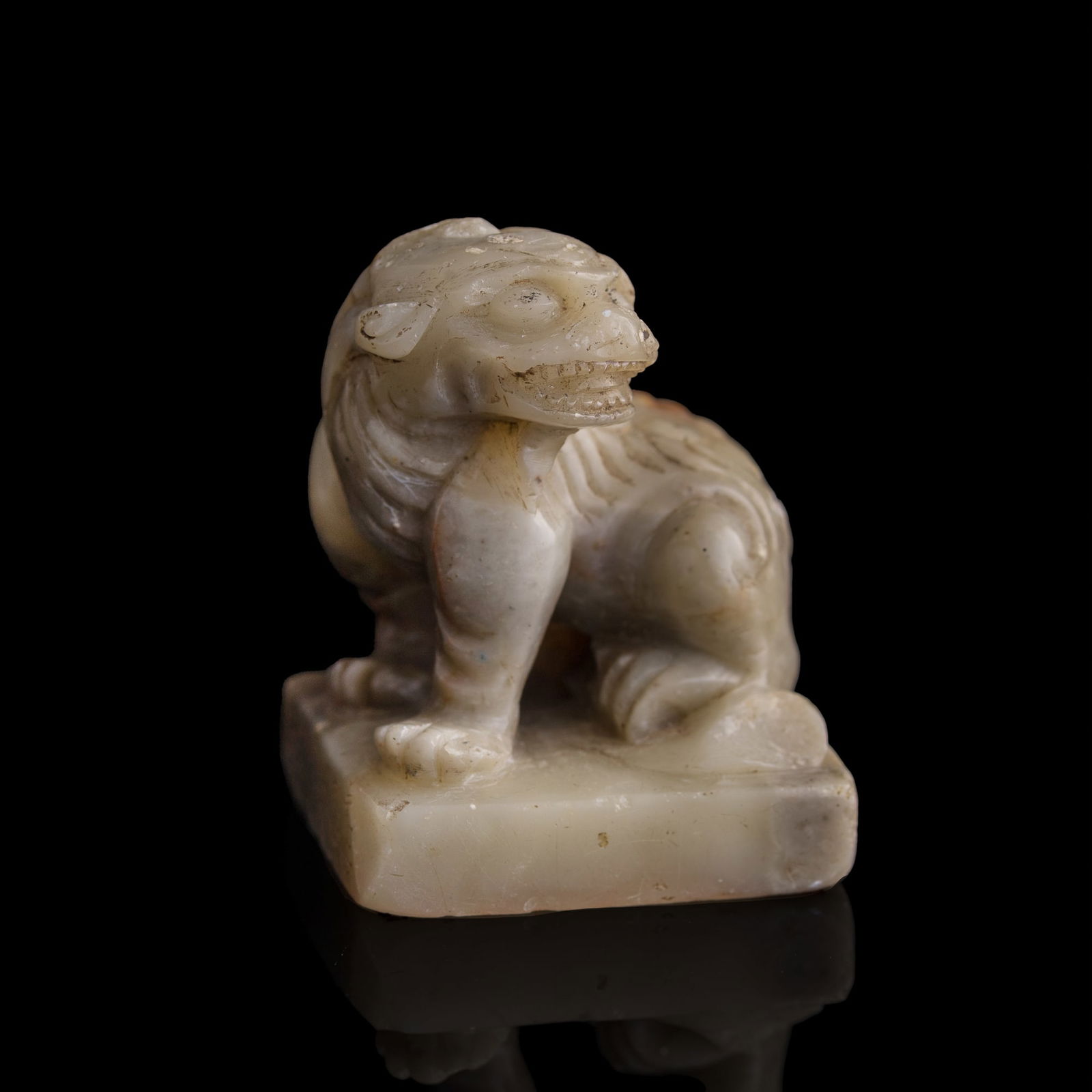 A Chinese Shoushan stone seal with lion finial, Qing dynasty (1 of 8)