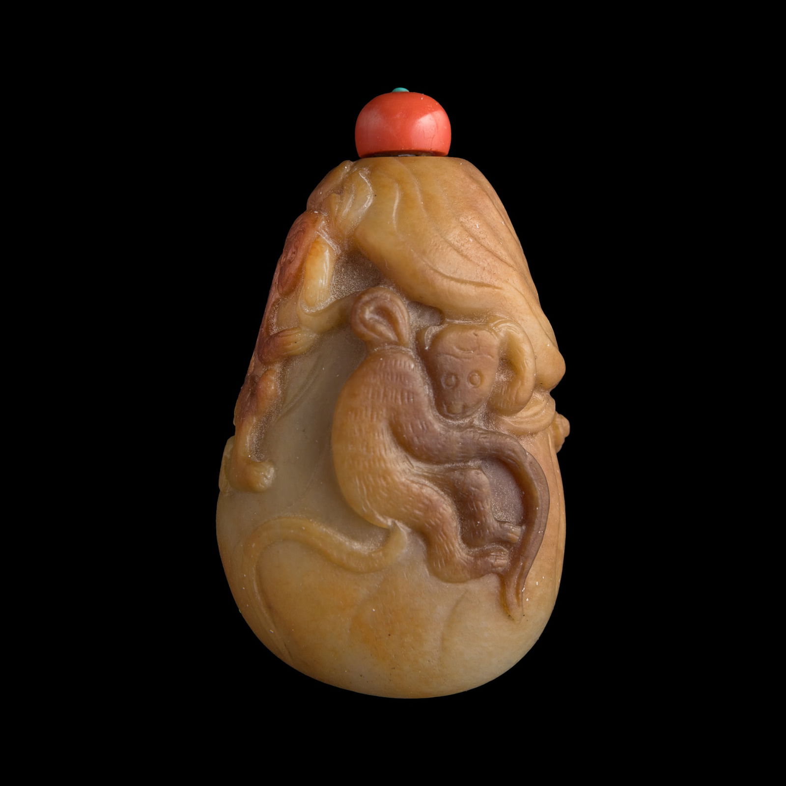 A Chinese yellow jade 'monkey' snuff bottle, 18th century (1 of 9)