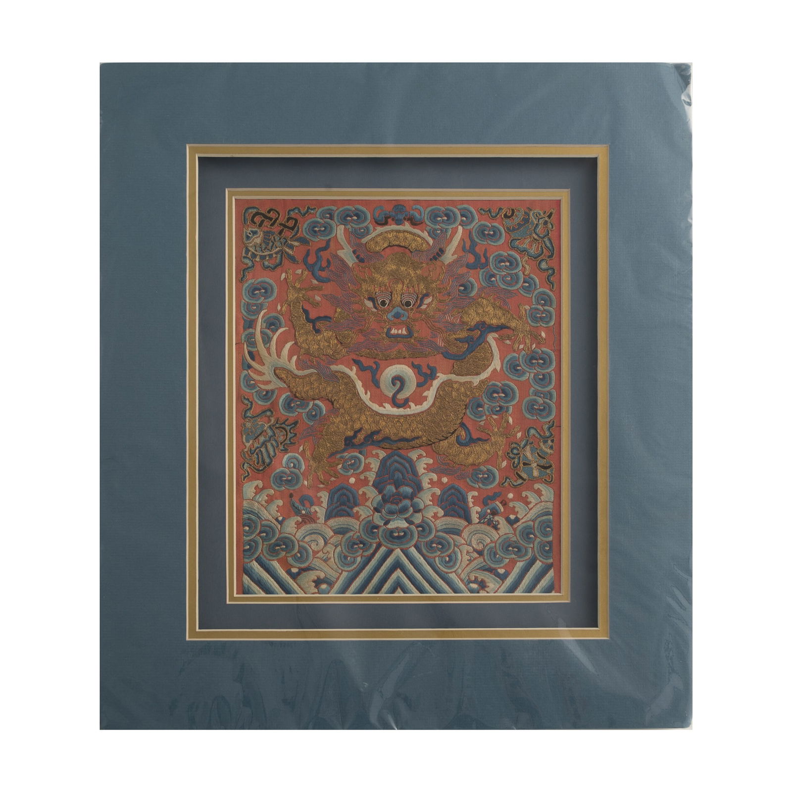 A Chinese red-ground gold-thread embroidered 'dragon' rank badge, 19th century (1 of 5)