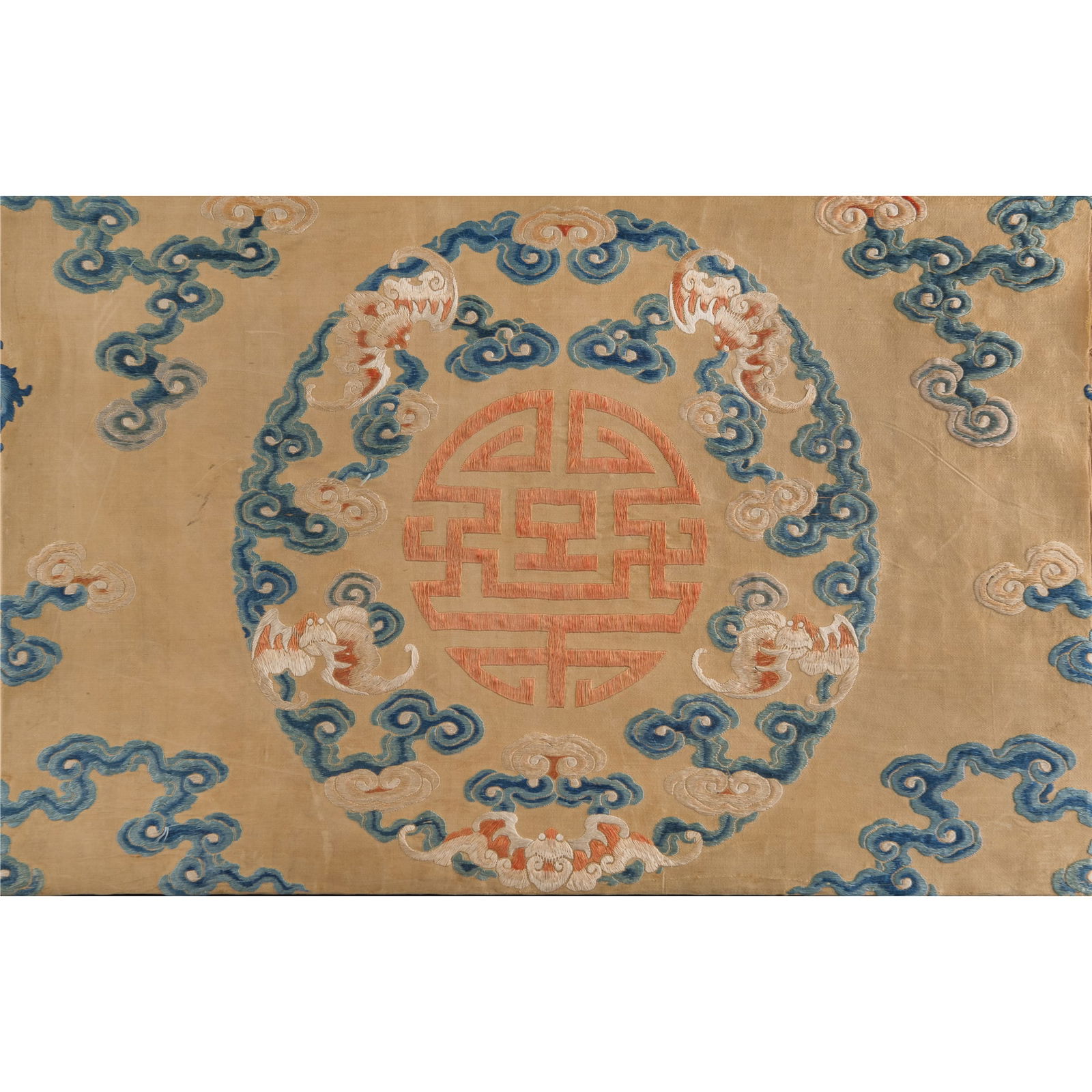 A Chinese embroidered 'auspicious clouds' panel, early 19th century (1 of 4)