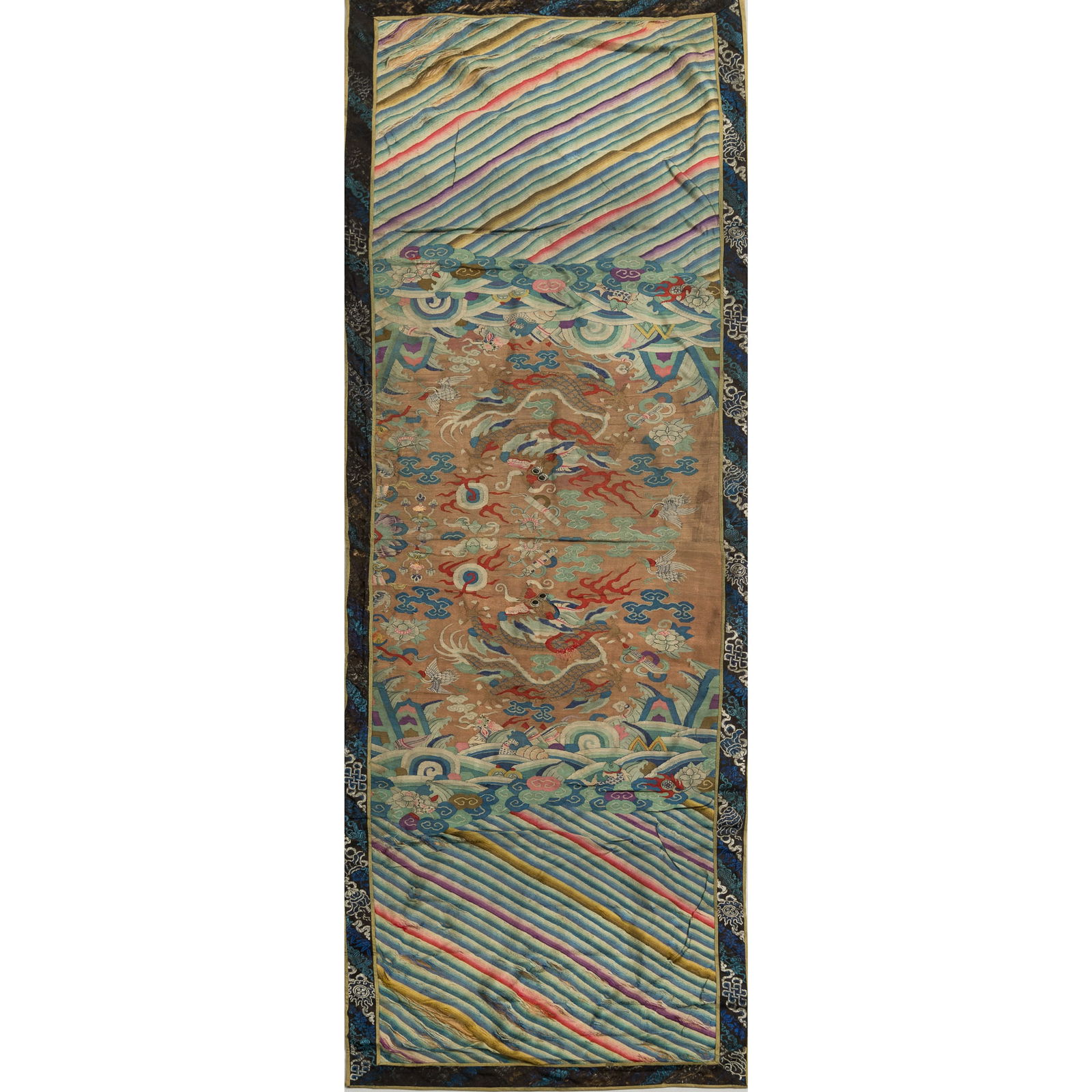 A Chinese kesi 'dragon' panel, 19th century: A Chinese kesi 'dragon' panel 19th century H: 59 1/2, W: 17 3/4 in. (H: 151.1, W: 45.1 cm.) From Mrs. Wang in Raleigh, North Carolina. Click here for high resolu