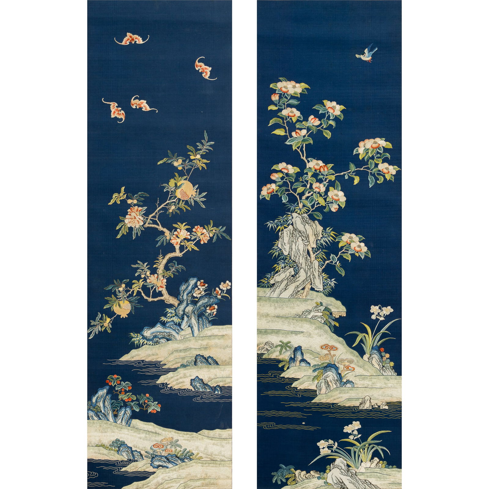 A pair of Chinese blue-ground 'landscape' and 'flower' embroideries, 18th century (1 of 9)