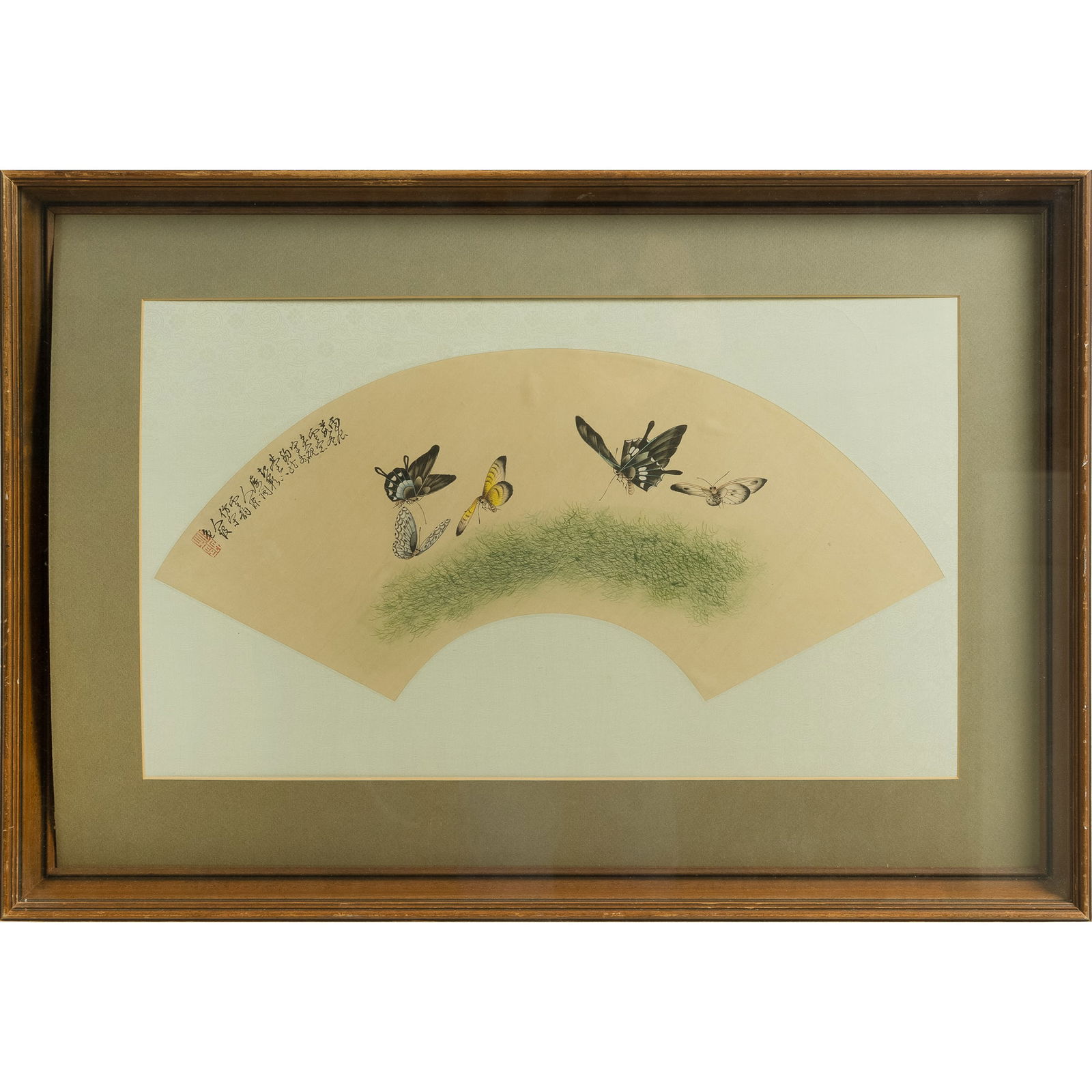 A Chinese fan painting of butterflies, by Chen Yunyun: A Chinese fan painting of butterfliesby Chen YunyunThe fan features butterflies, and it includes a signature, date, one seal, and is mounted on a silk backing, matted, and framed.Sight dimensions: H: