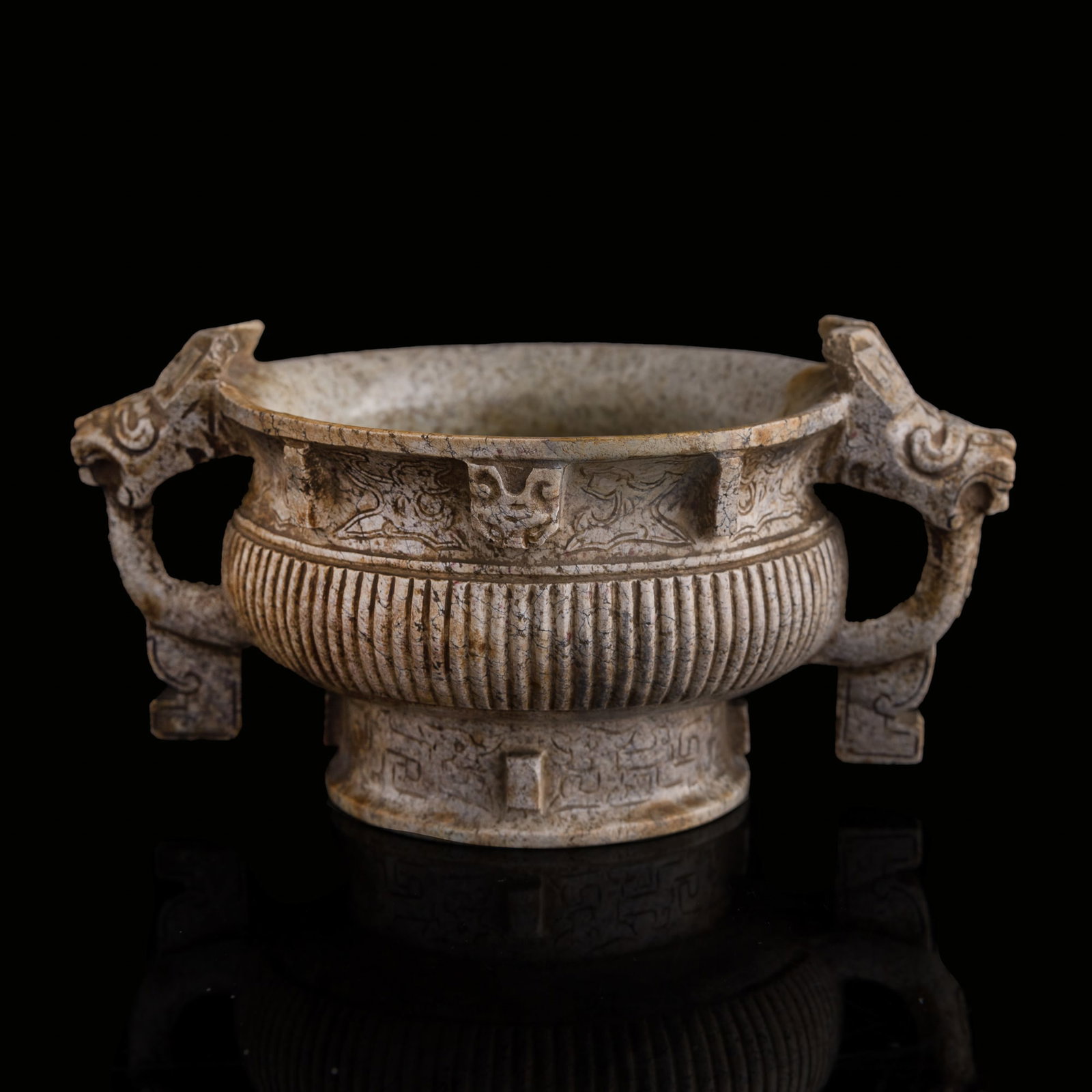 A Chinese heat-altered jade gui-form censer, Ming dynasty: A Chinese heat-altered jade gui-form censer Ming dynasty H: 3 3/8, W: 6 3/4, D: 4 5/8 in. (H: 8.6, W: 17.1, D: 11.7 cm.) Private collection, Fremont, California.