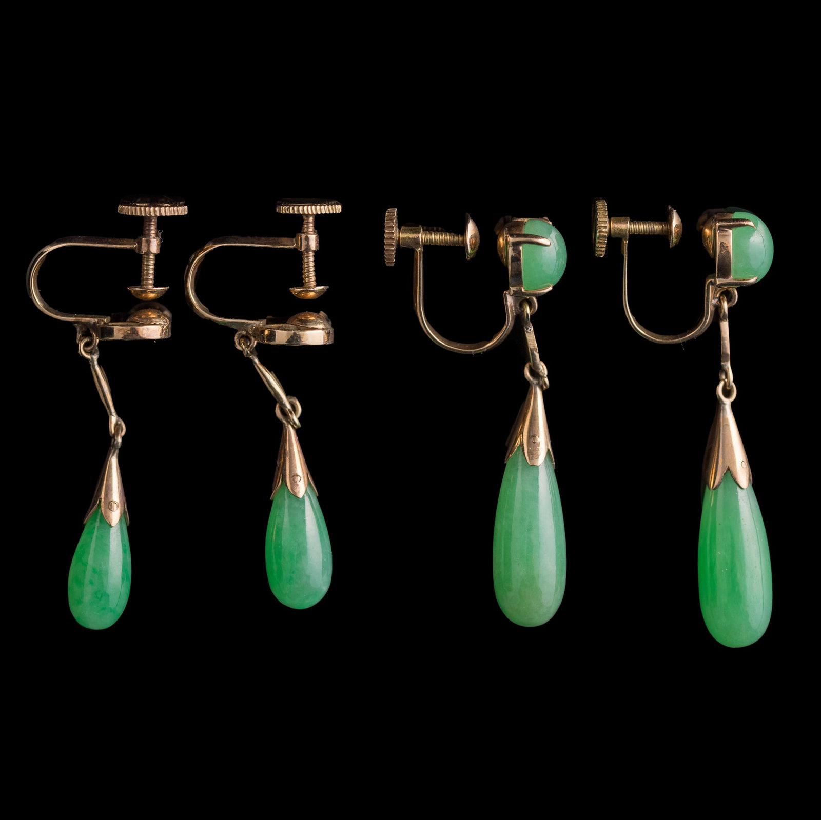 Two pairs of Chinese jadeite-set metal earrings,: Two pairs of Chinese jadeite-set metal earrings One pair stamped “18K” and “PARIS”; the other pair stamped “14K” and “PARIS.” (4). H: 1 3/8, W: 1/4, D: 5/8 in. (H: 3.5,