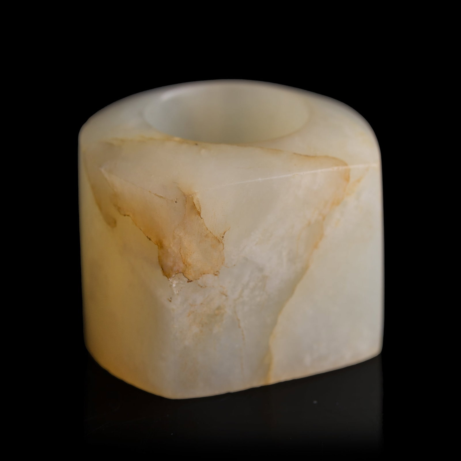 A Chinese white jade archer’s ring, 19th century: A Chinese white jade archer’s ring 19th century Inner Dia.: 21, H: 32.7 mm From Mr. Luk in Campbell, California; inherited from his parents in Hong Kong.