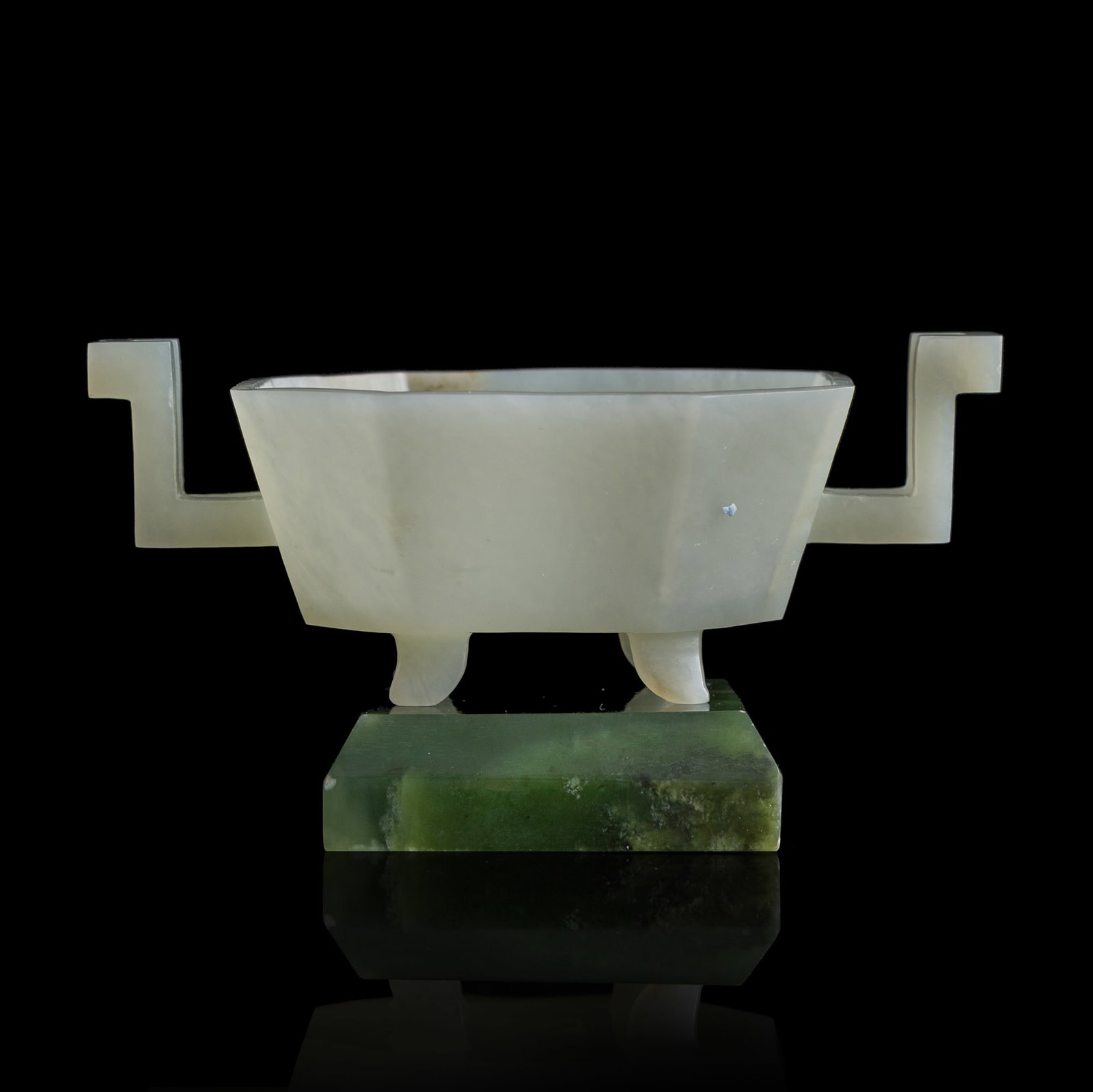 A Chinese white jade ding-form censer with spinach jade stand, Qing dynasty (1 of 6)