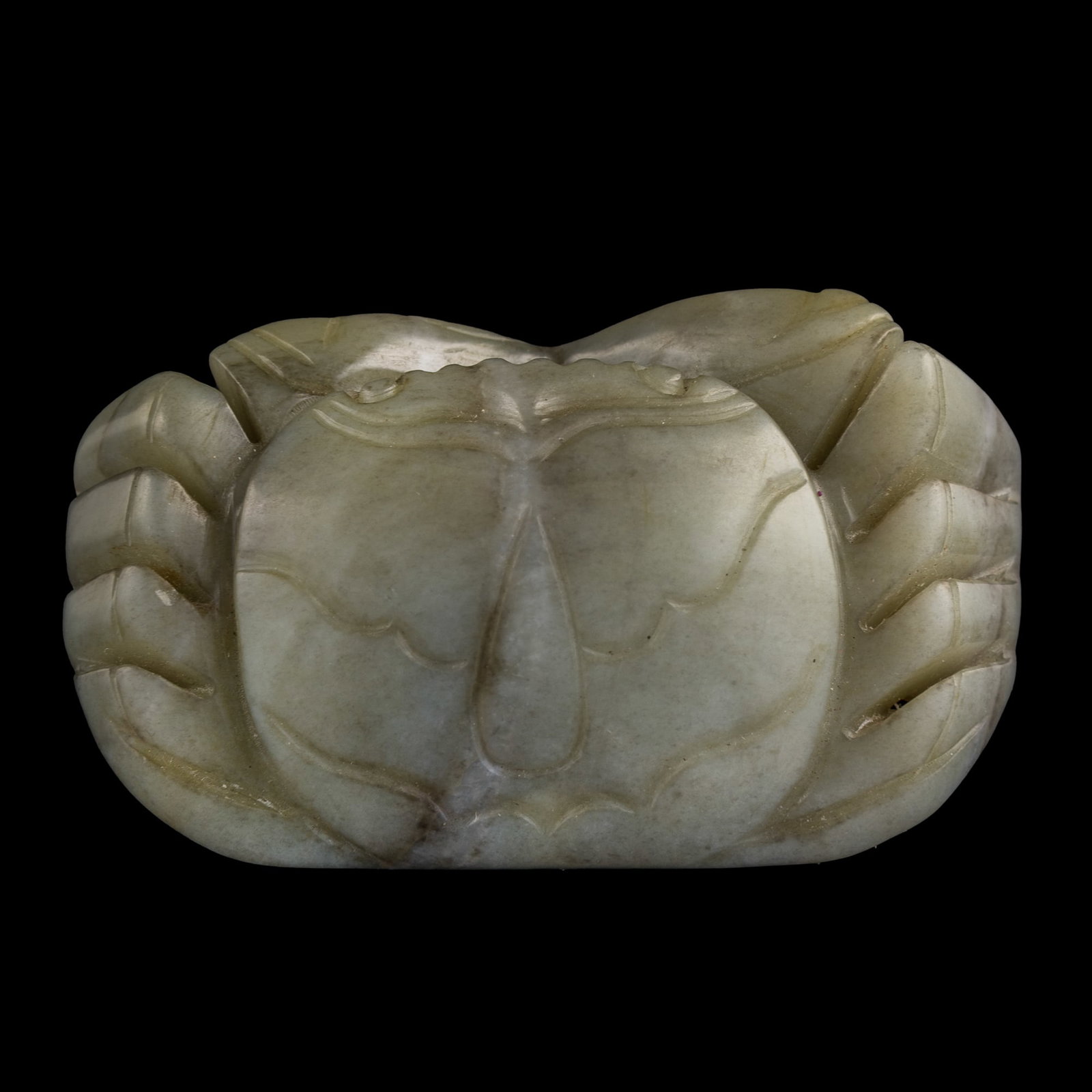 A Chinese carved jade crab, 19th century: A Chinese carved jade crab 19th century H: 3/4, W: 2 5/8, D: 1 1/2 in. (H: 1.9, W: 6.7, D: 3.8 cm.) Private collection, Rowland Heights, California. Private collection, Florida.