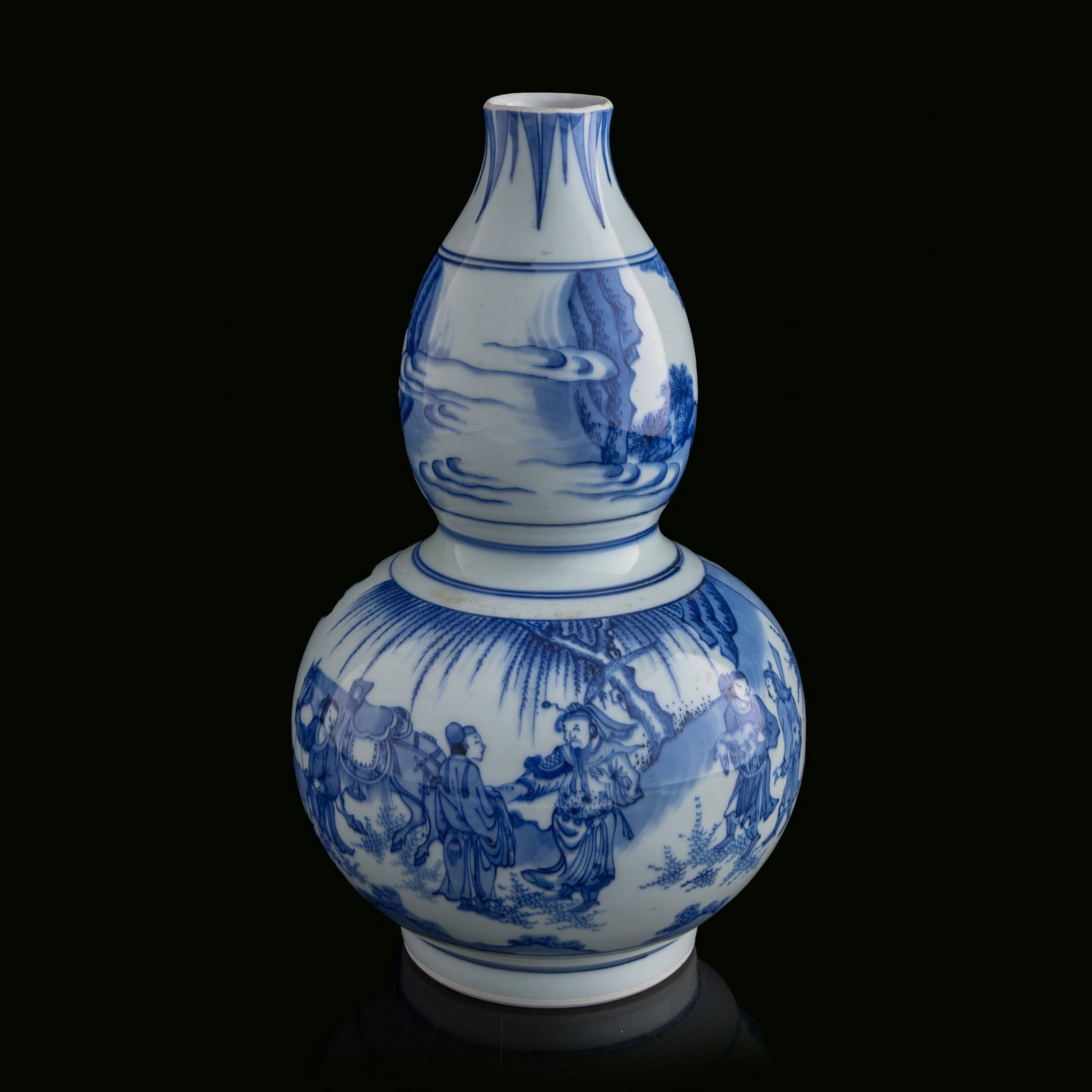 A Chinese blue and white double gourd-form vase, Chongzhen period, Ming dynasty (1 of 9)