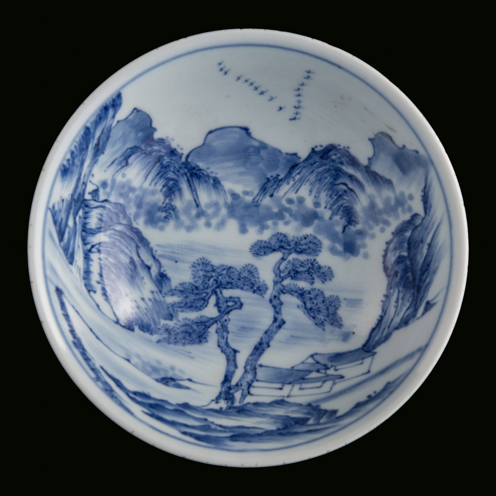 A Chinese blue and white 'landscape' bowl with recessed foot, 18th century: A Chinese blue and white 'landscape' bowl with recessed foot 18th century H: 1 3/4, Dia: 5 7/8 in. (H: 4.4, Dia: 14.9 cm.) Private collection, Mountain View, California.