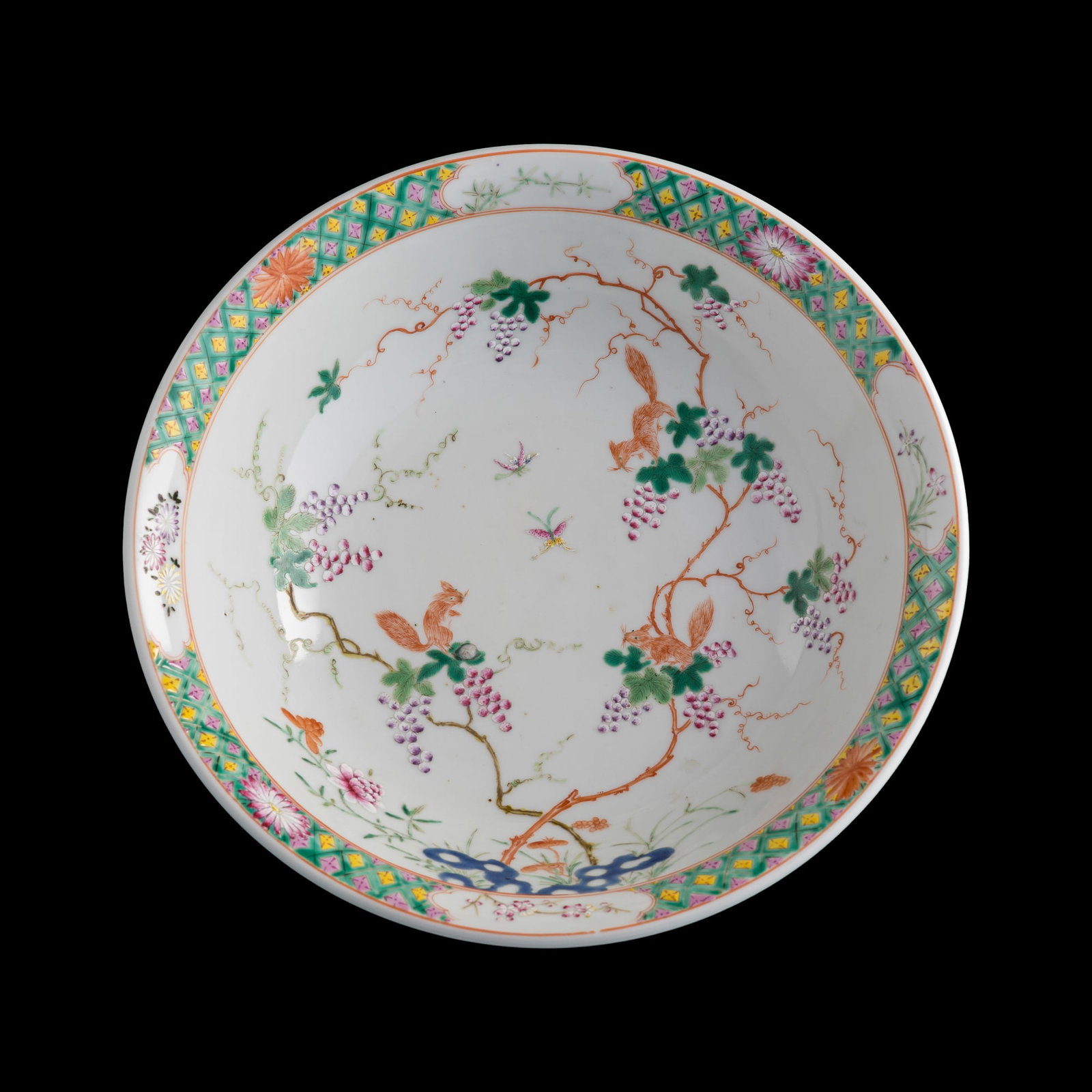 A large Chinese famille rose 'squirrel and grapes' bowl, late 19th century (1 of 6)