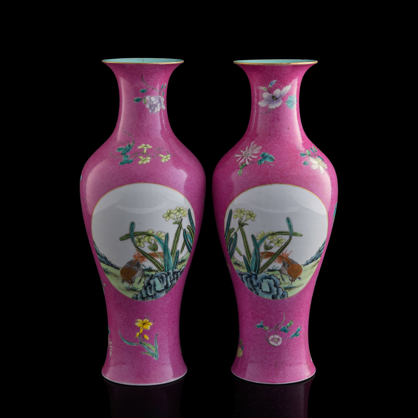 A pair of Chinese ruby red-ground famille rose sgraffito Guanyin vases, Republic period: A pair of Chinese ruby red-ground famille rose sgraffito Guanyin vases Republic period Each with turquoise-glazed interior, 'flower and bird' motif to exterior body, and six-character mark to undersid
