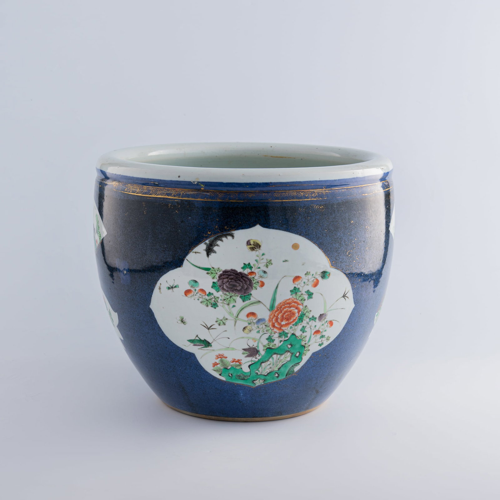 A Chinese powder blue-ground wucai jardiniere, 19th century: A Chinese powder blue-ground wucai jardiniere 19th century H: 12, Dia: 14 in. (H: 30.5, Dia: 35.6 cm.) Private collection, Rowland Heights, California. Private collection, New Jersey.
