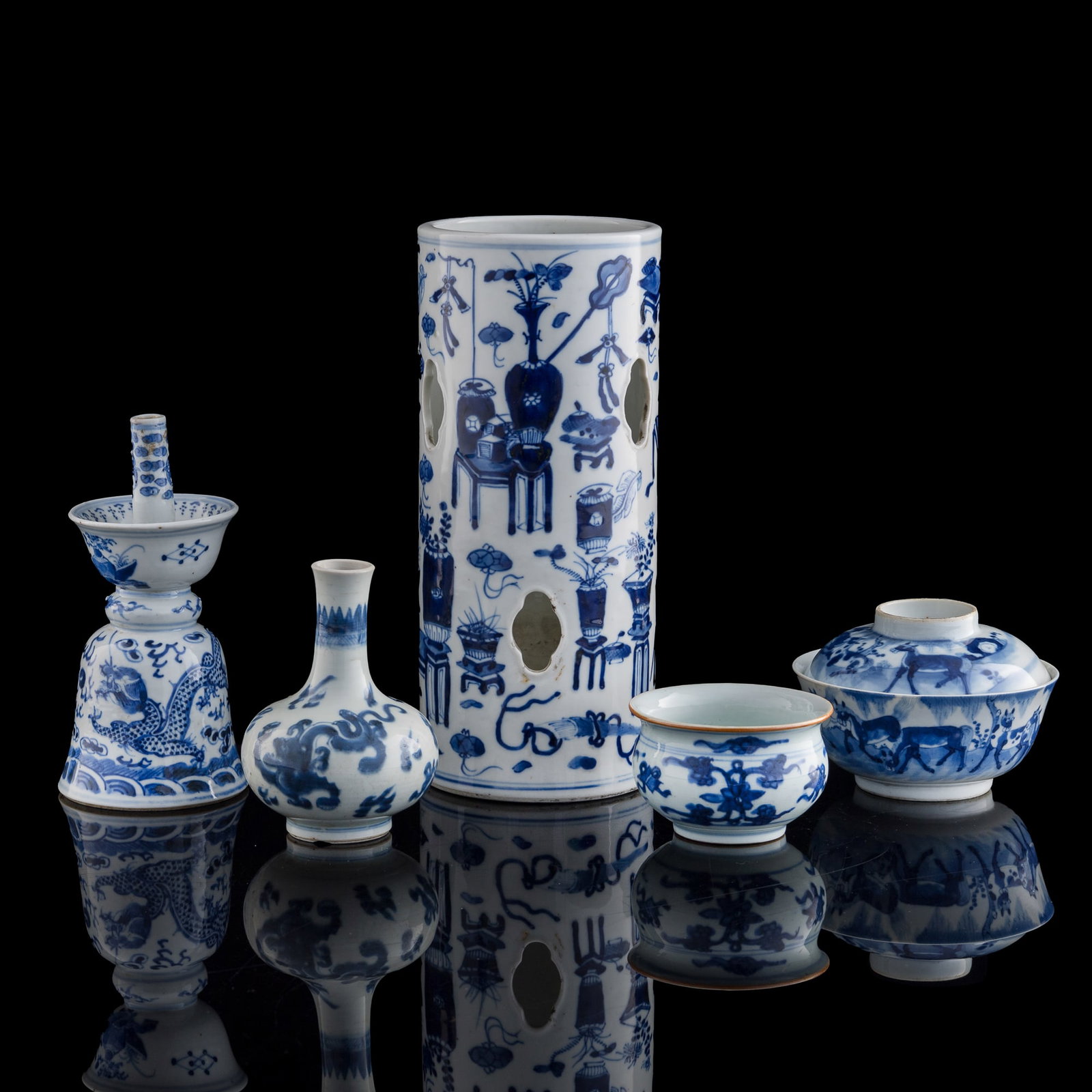 Five assorted Chinese blue and white items, 18th/19th century: Five assorted Chinese blue and white items 18th/19th century Comprising a hat stand; lidded bowl; censer; tianqiuping vase; and candlestick holder. (5). H: 11 1/2, Dia: 5 in. (H: 29.2, Dia: 12.7 cm. (