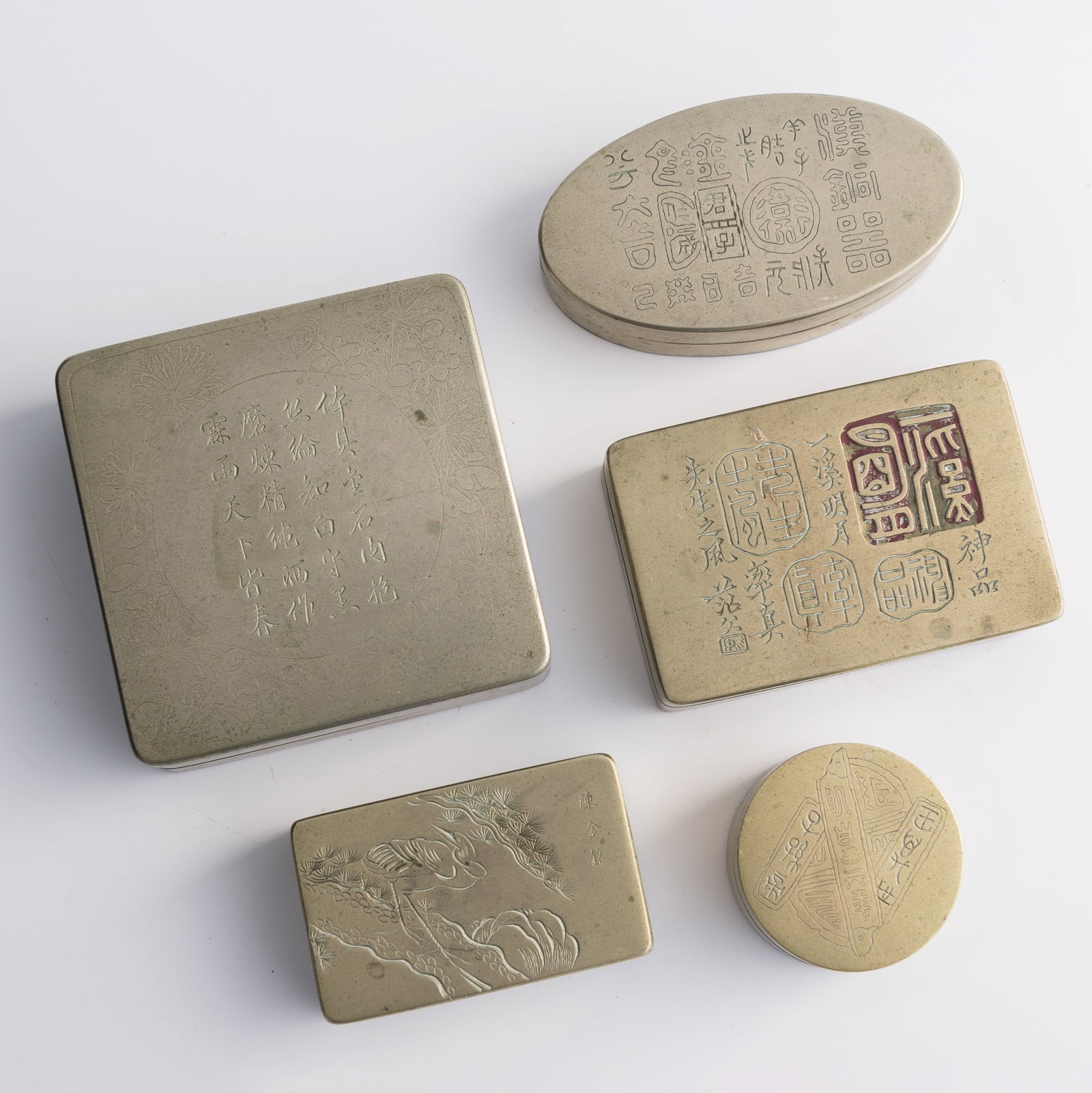Five Chinese paktong ink boxes, Qing dynasty/Republic period: Five Chinese paktong ink boxes Qing dynasty/Republic period One with two-character mark to underside. (5). H: 1 1/8, W: 3 3/4, D: 3 3/4 in. (H: 2.9, W: 9.5, D: 9.5 cm. (largest)) Weight: 1085 g (overa