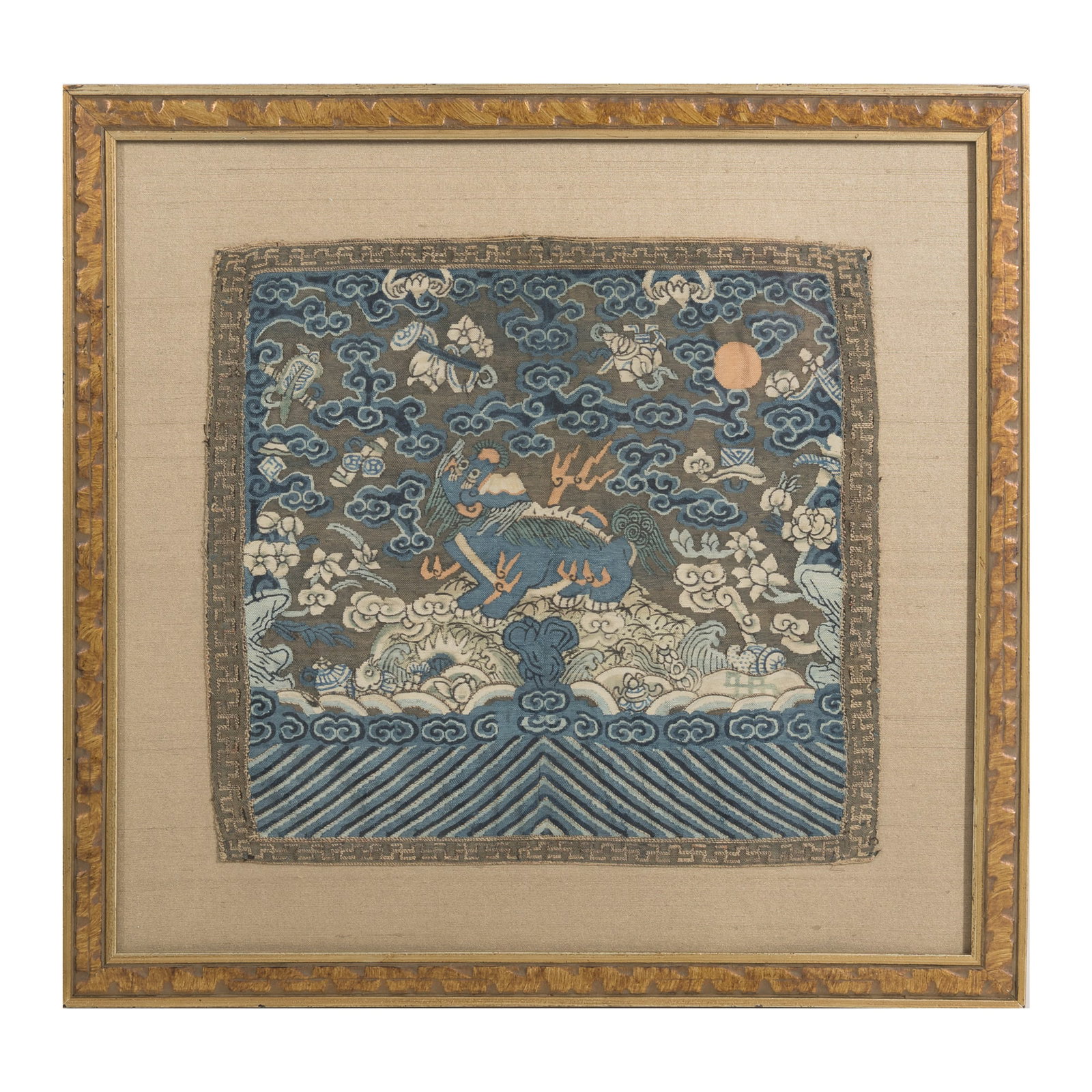 A Chinese kesi military rank badge, 19th century: A Chinese kesi military rank badge 19th century framed. Sight dimensions: H: 11, W: 11 1/2 in. (H: 27.9, W: 29.2 cm.) Overall dimensions: H: 16 1/2, W: 17 1/8 in. (H: 41.9, W: 43.5 cm.) From Mr. Kaufm