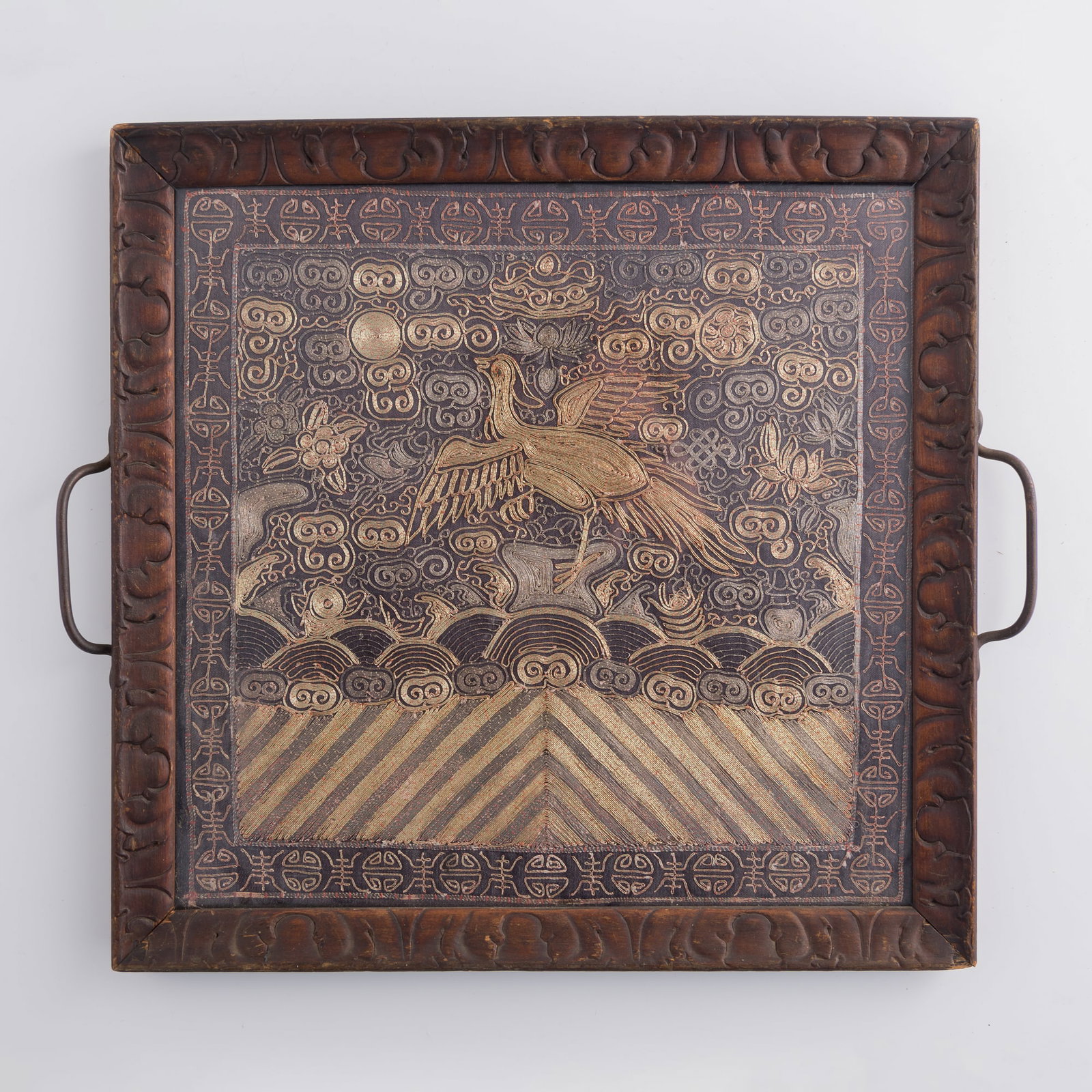 A Chinese rank badge embroidered with gilt and red threads, late 19th century: A Chinese rank badge embroidered with gilt and red threads late 19th century framed. Rank Badge: H: 11 5/8, W: 12 in. (H: 29.5, W: 30.5 cm.) Overall: H: 13 5/8, W: 15 5/8 in. (H: 34.6, W: 39.7 cm.) Pr