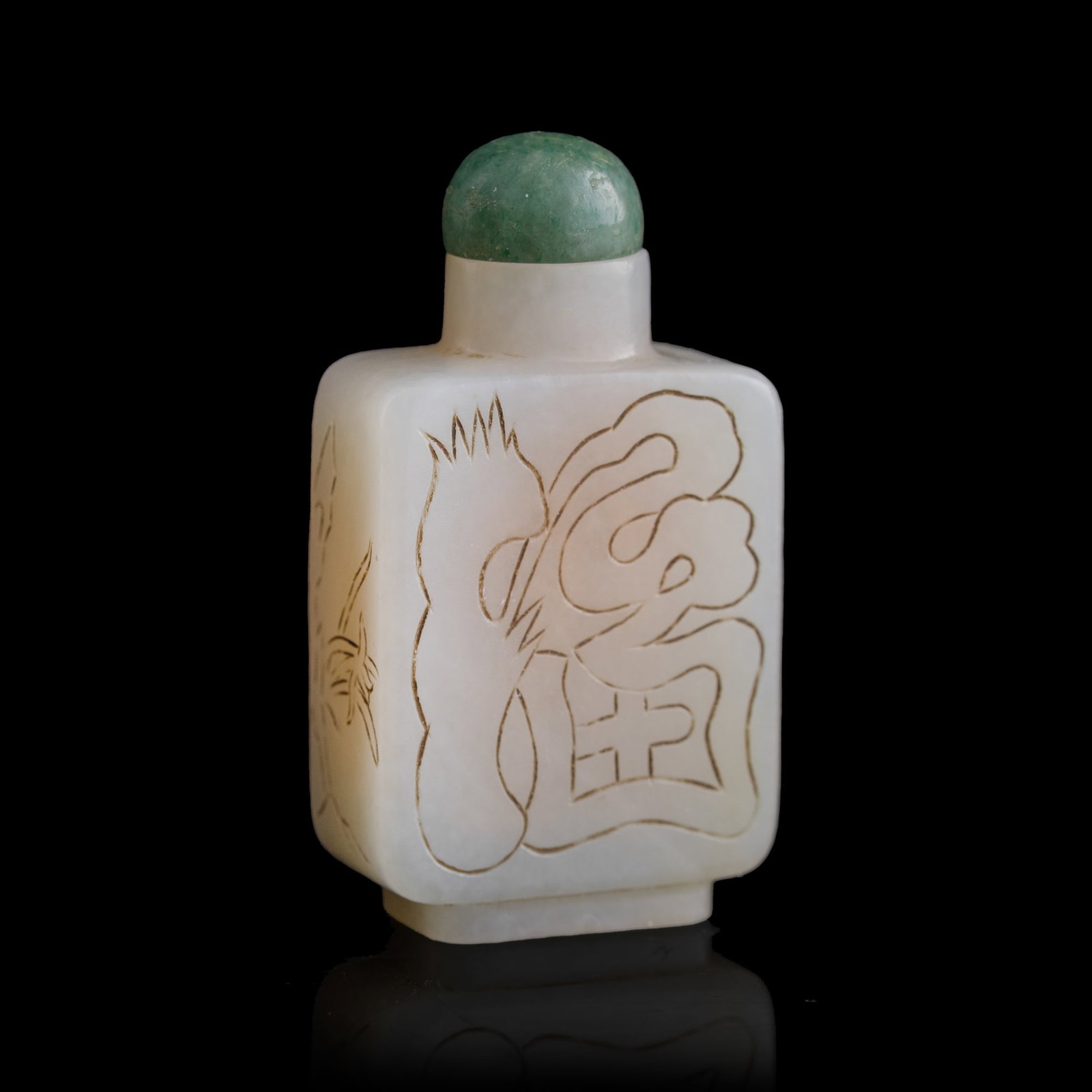 A Chinese white jade ‘longevity’ snuff bottle, 19th century: A Chinese white jade 'longevity' snuff bottle 19th century H: 2 5/8, W: 1 1/2, D: 3/4 in. (H: 6.7, W: 3.8, D: 1.9 cm.) From Mr. Tinero, Calabasas, California; acquired by his father in Hong Kong durin