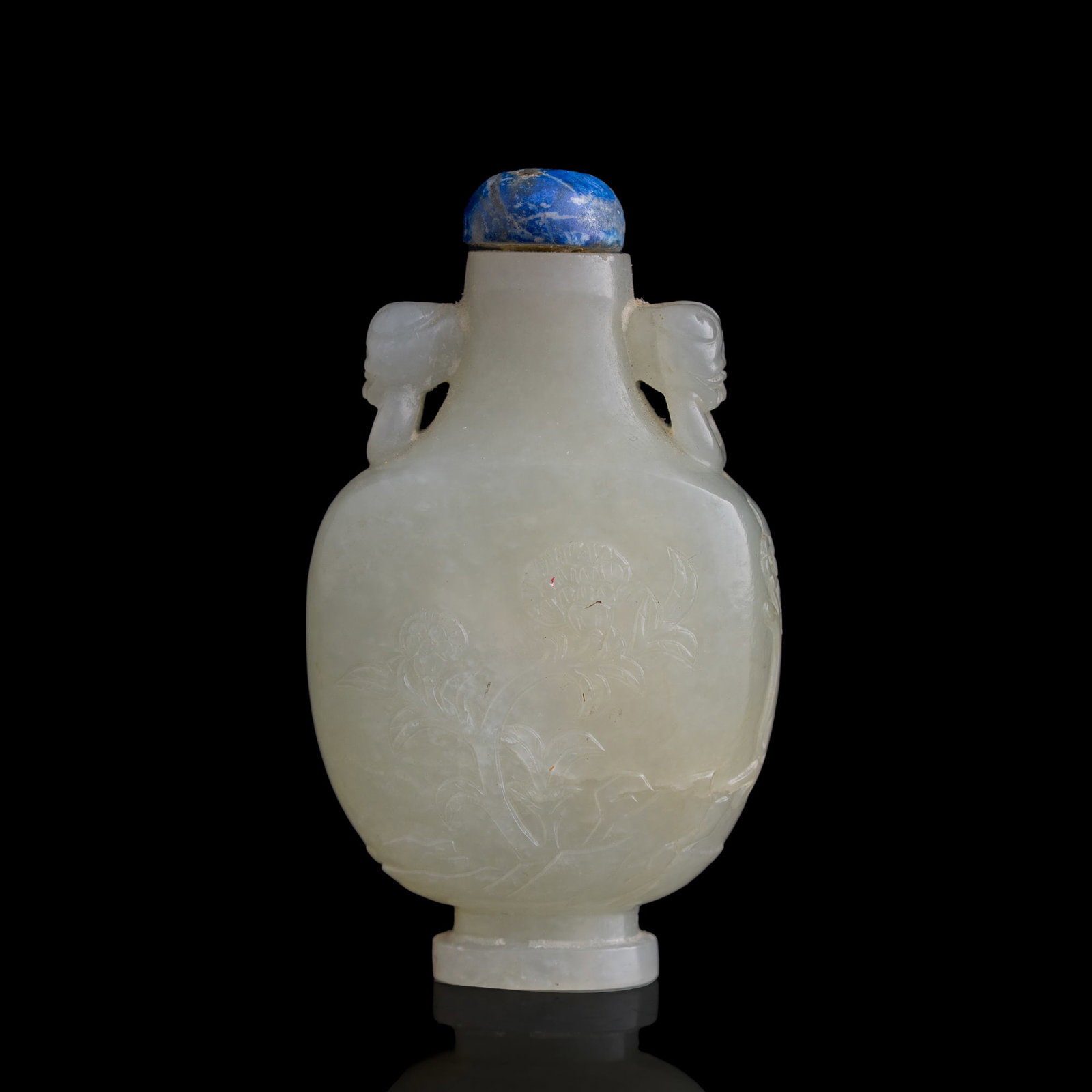 A Chinese carved white jade snuff bottle with elephant-head handles, 18th century: A Chinese carved white jade snuff bottle with elephant-head handles 18th century H: 3, W: 1 3/4, D: 1 in. (H: 7.6, W: 4.4, D: 2.5 cm.) From Mr. Tinero, Calabasas, California; acquired by his father in