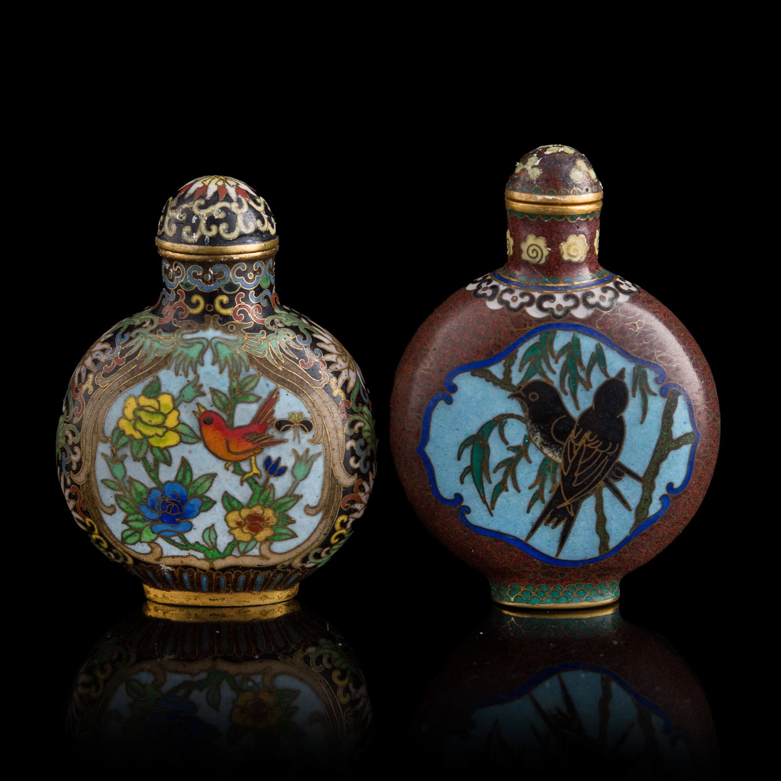 Two Chinese cloisonne snuff bottles, Republic period or later: Two Chinese cloisonne snuff bottles Republic period or later One with four-character mark to underside. (2). H: 2 3/4, W: 2, D: 7/8 in. (H: 7, W: 5.1, D: 2.2 cm. (tallest)) Acquired by a private colle