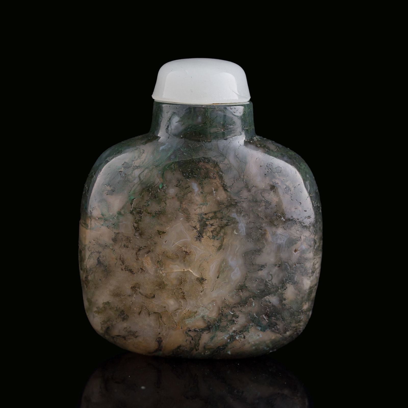 A Chinese moss agate snuff bottle, 19th century: A Chinese moss agate snuff bottle 19th century H: 2 3/4, W: 2 1/4, D: 7/8 in. (H: 7, W: 5.7, D: 2.2 cm.) Private collection, Las Vegas, Nevada. C