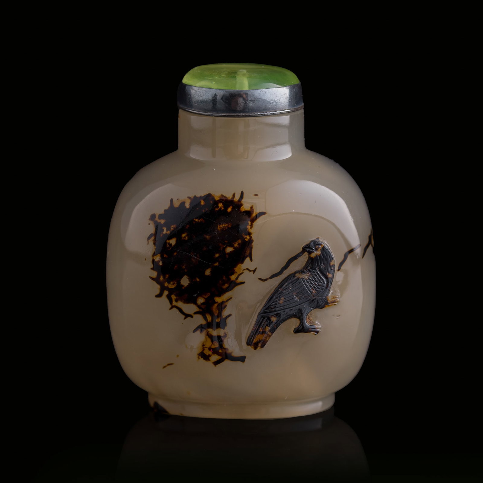 A Chinese agate 'flower and bird' snuff bottle, 18th century: A Chinese agate 'flower and bird' snuff bottle 18th century H: 3 1/4, W: 2 1/2, D: 1 7/8 in. (H: 8.3, W: 6.4, D: 4.8 cm.) From Ms. Chang, Flushing, New York; a family heirloom.