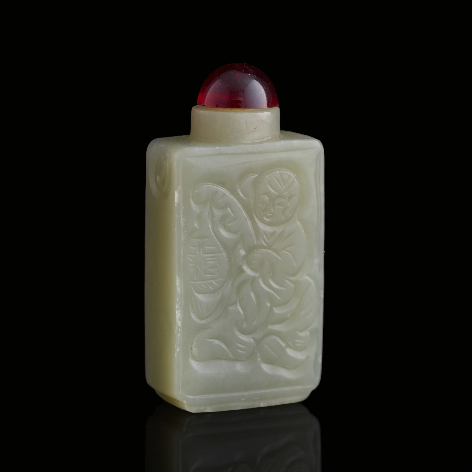 A Chinese jade 'boy' snuff bottle, 19th century: A Chinese jade 'boy' snuff bottle 19th century H: 2 1/2, W: 1 1/4, D: 5/8 in. (H: 6.4, W: 3.2, D: 1.6 cm.) Private collection, Las Vegas, Nevada.