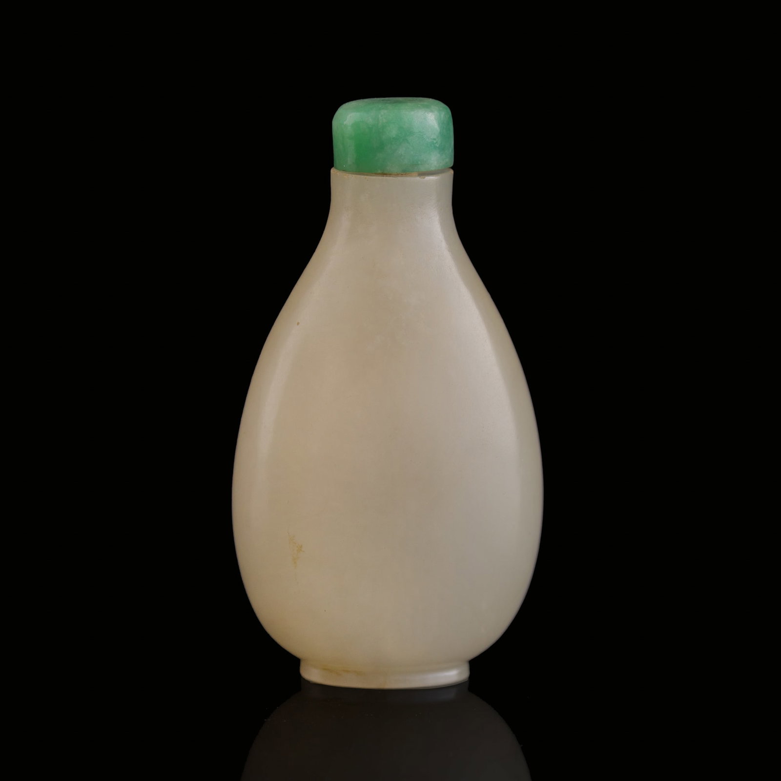 A Chinese white jade snuff bottle, 18th/19th century: A Chinese white jade snuff bottle 18th/19th century H: 2 3/4, W: 1 3/8, D: 1 in. (H: 7, W: 3.5, D: 2.5 cm.) From the estate of Mr. Perry, Jacksonville, Florida.