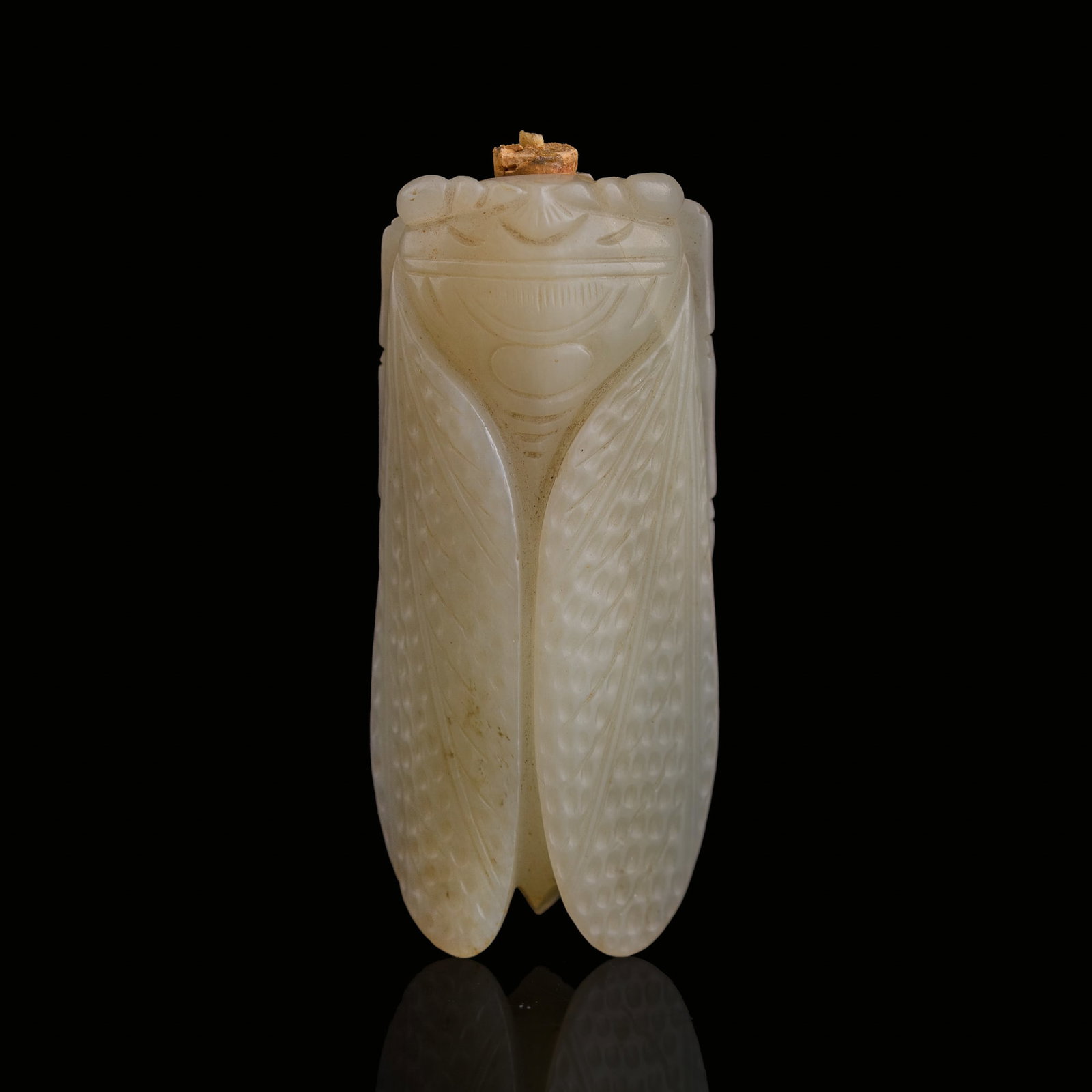 A Chinese carved white jade cicada-form snuff bottle, 18th century: A Chinese carved white jade cicada-form snuff bottle 18th century H: 2 5/8, W: 1 1/8, D: 7/8 in. (H: 6.7, W: 2.9, D: 2.2 cm.) From the estate of Mr. Perry, Jacksonville, Florida.