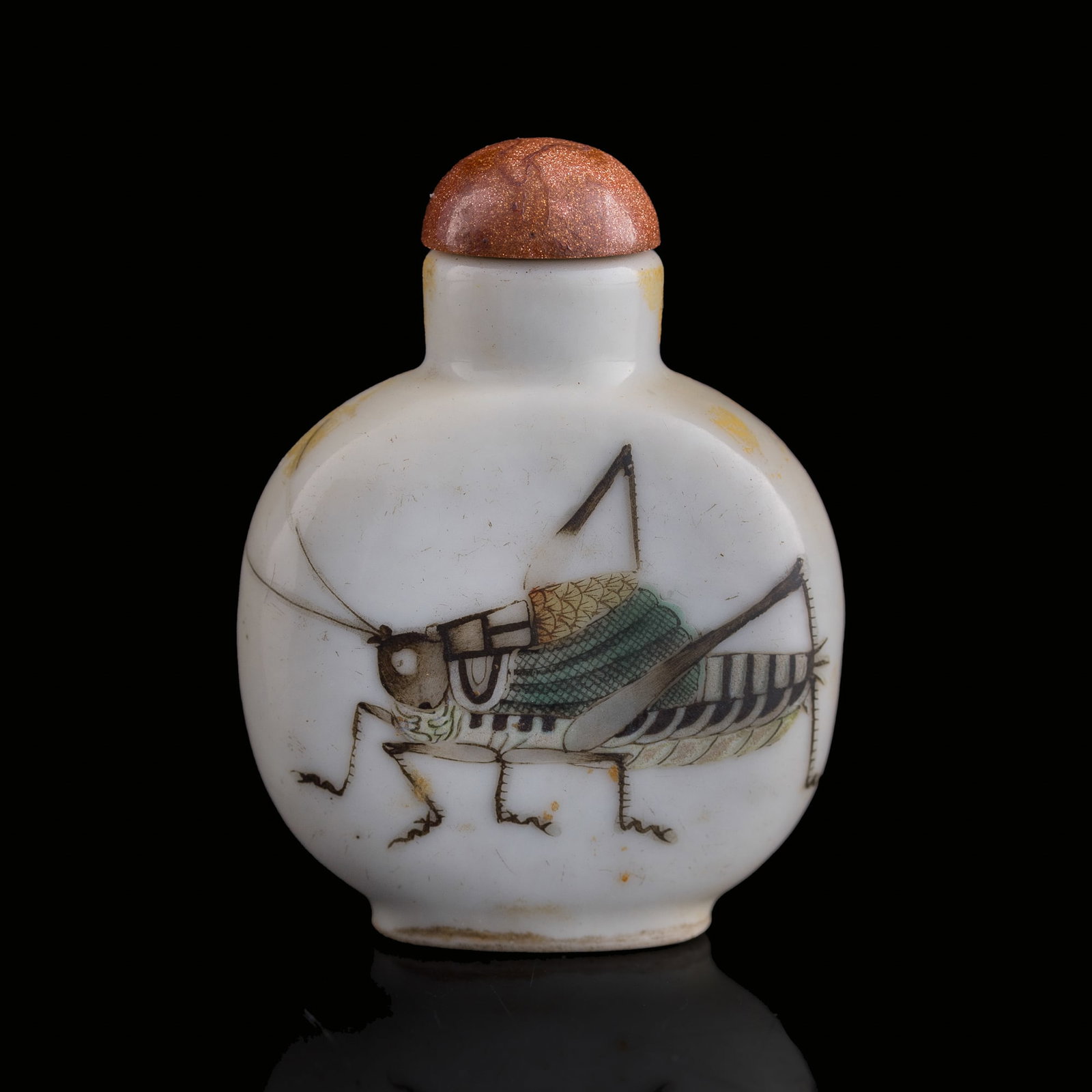 A Chinese famille rose 'grasshopper' snuff bottle, Daoguang period, Qing dynasty: A Chinese famille rose 'grasshopper' snuff bottle Daoguang period, Qing dynasty With four-character Daoguang mark to underside. H: 2 3/8, W: 1 3/4, D: 1 in. (H: 6, W: 4.4, D: 2.5 cm.) From the estate 